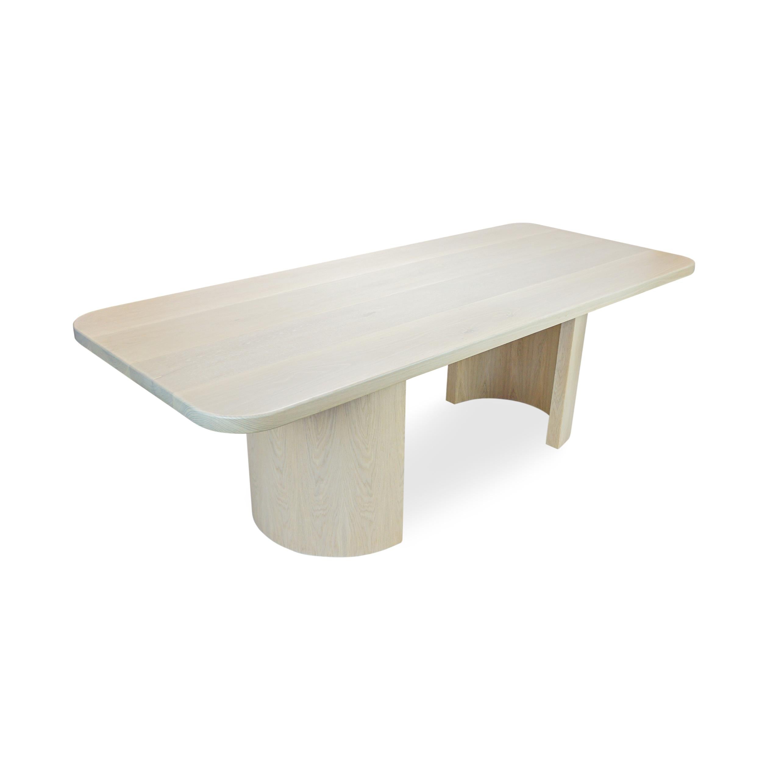 https://a.1stdibscdn.com/modern-rectangular-white-oak-dining-table-w-half-cylinder-legs-round-corners-for-sale-picture-4/f_21233/f_335760421680209499831/White_Oak_Half_Moon_Dining_Table_Angle_Elevation2_master.jpg