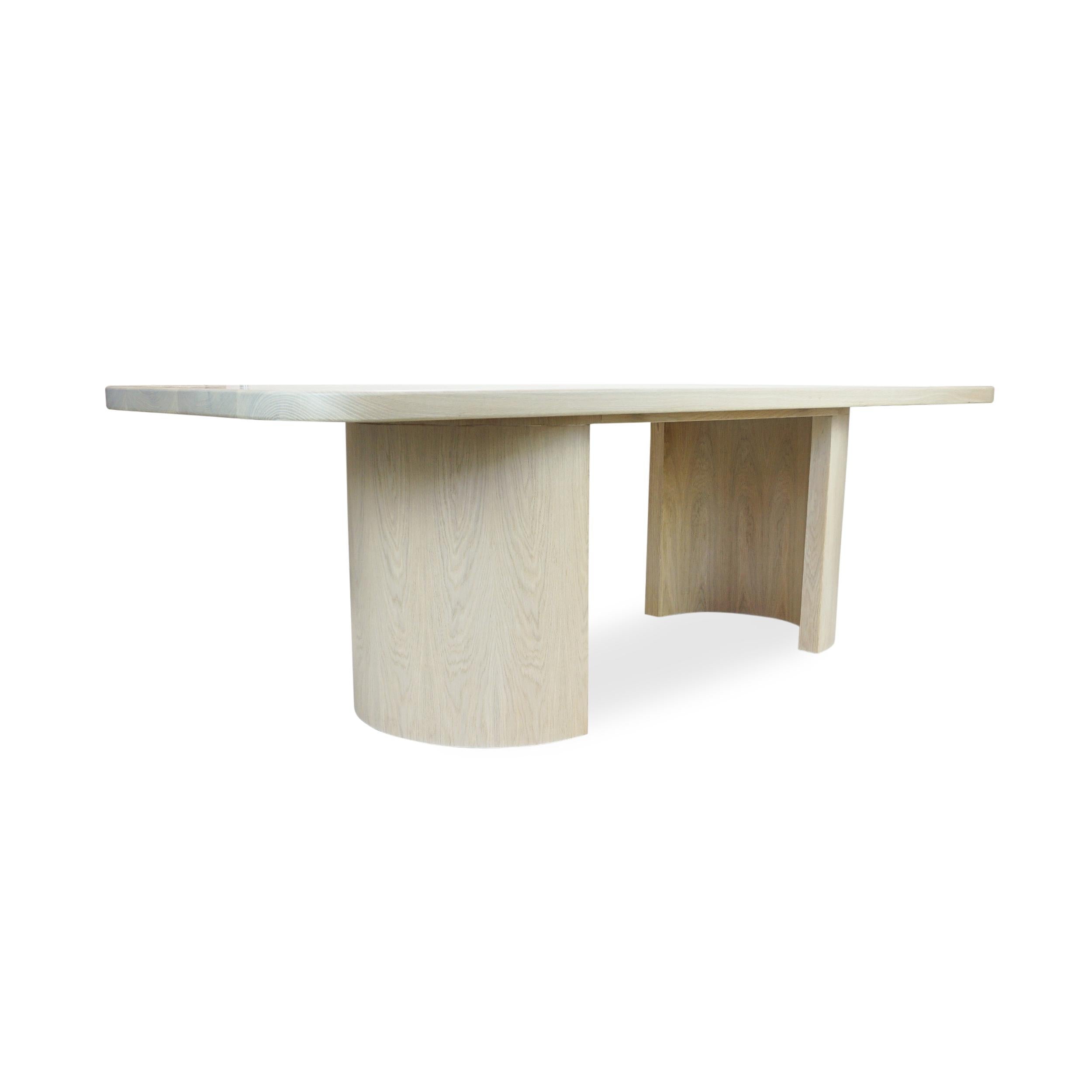 https://a.1stdibscdn.com/modern-rectangular-white-oak-dining-table-w-half-cylinder-legs-round-corners-for-sale-picture-3/f_21233/f_335760421680209498078/White_Oak_Half_Moon_Dining_Table_Angle_master.jpg