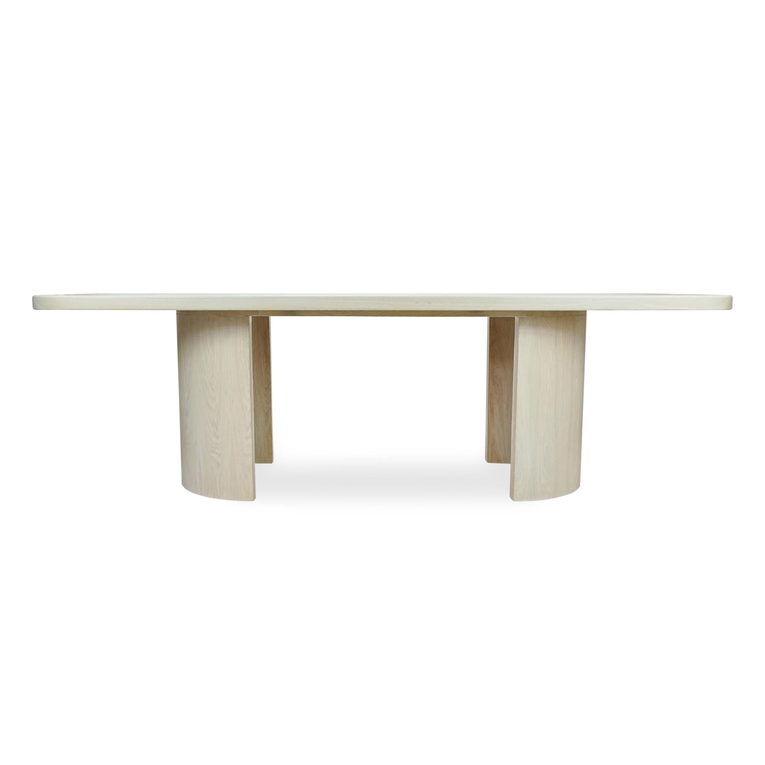 https://a.1stdibscdn.com/modern-rectangular-white-oak-dining-table-w-half-cylinder-legs-round-corners-for-sale-picture-5/f_21233/f_335760421680209504285/White_Oak_Half_Moon_Dining_Table_Front_master.jpg