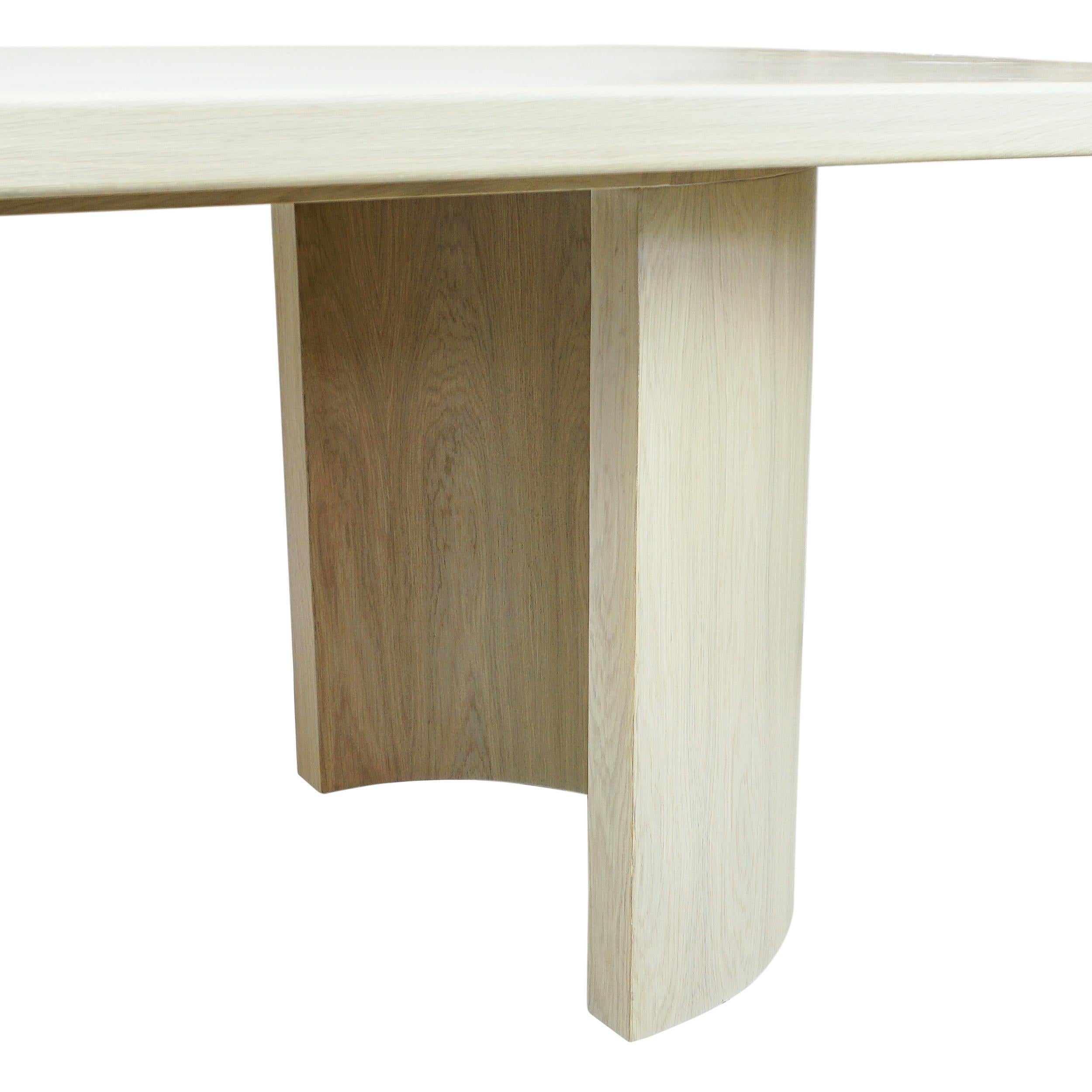 https://a.1stdibscdn.com/modern-rectangular-white-oak-dining-table-w-half-cylinder-legs-round-corners-for-sale-picture-14/f_21233/f_335760421680209521098/White_Oak_Half_Moon_Dining_Table_Legs_Detail1_master.jpg