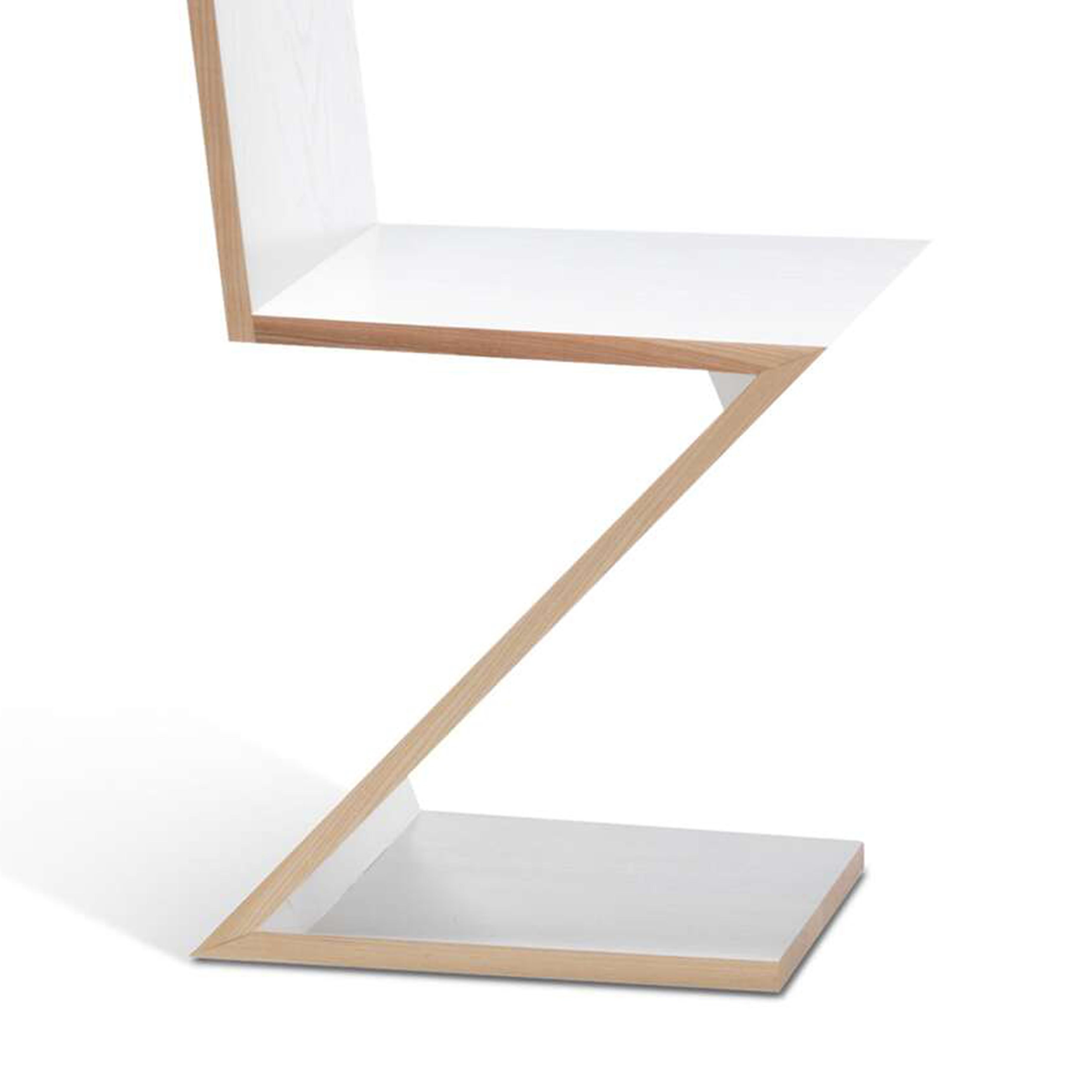 https://a.1stdibscdn.com/set-of-two-zig-zag-chair-by-gerrit-thomas-rietveld-for-cassina-for-sale-picture-3/f_14272/f_278123521647423664443/ZIGZAGB2_master.jpg