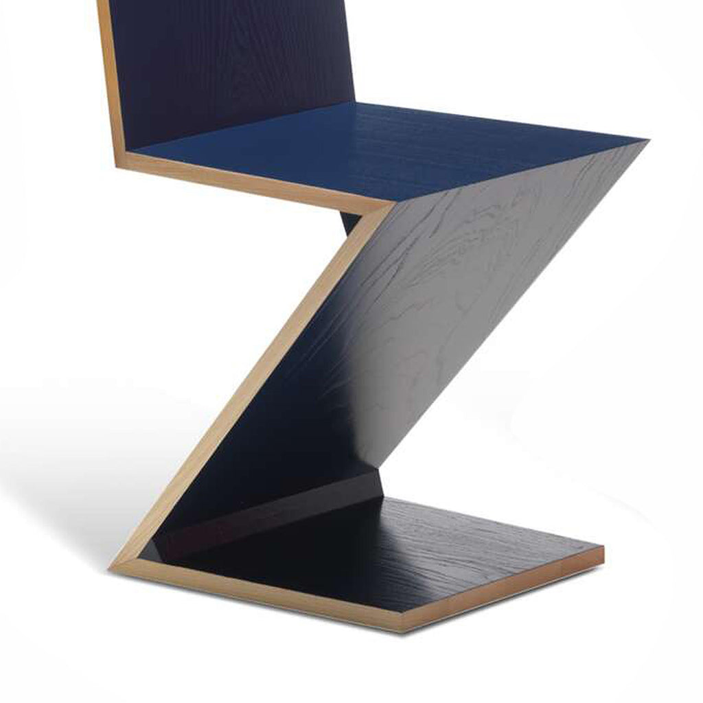 https://a.1stdibscdn.com/gerrit-thomas-rietveld-zig-zag-chair-by-cassina-for-sale-picture-3/f_14272/f_277755521647251984383/ZIGZAGBLUE2_master.jpg