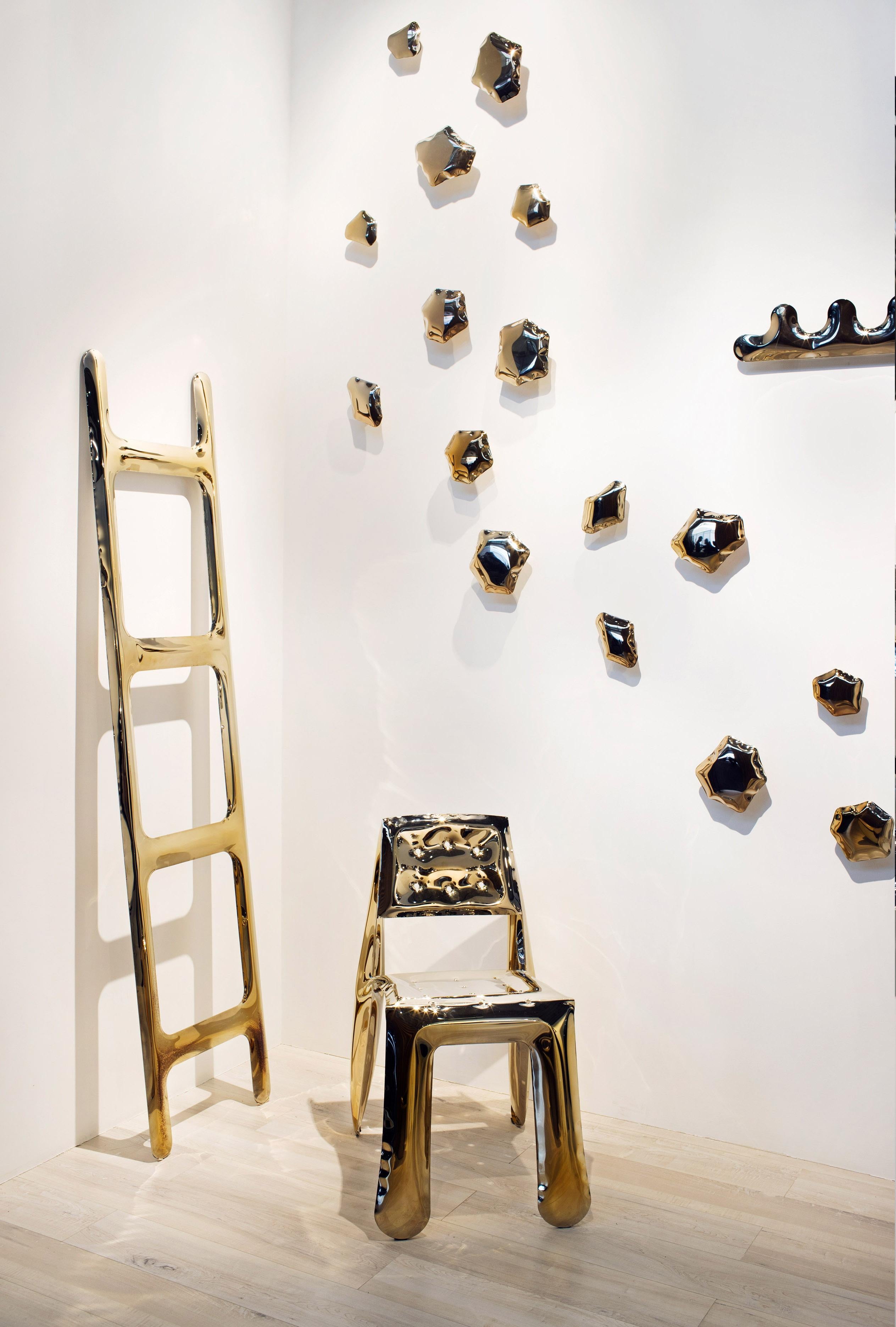 https://a.1stdibscdn.com/flamed-gold-chippensteel-50-sculptural-chair-by-zieta-for-sale-picture-3/f_12192/f_276323421646429140069/Zieta_CHIPPENSTEEL_0_5_flamed_gold_Heat_Collection_7_master.JPG
