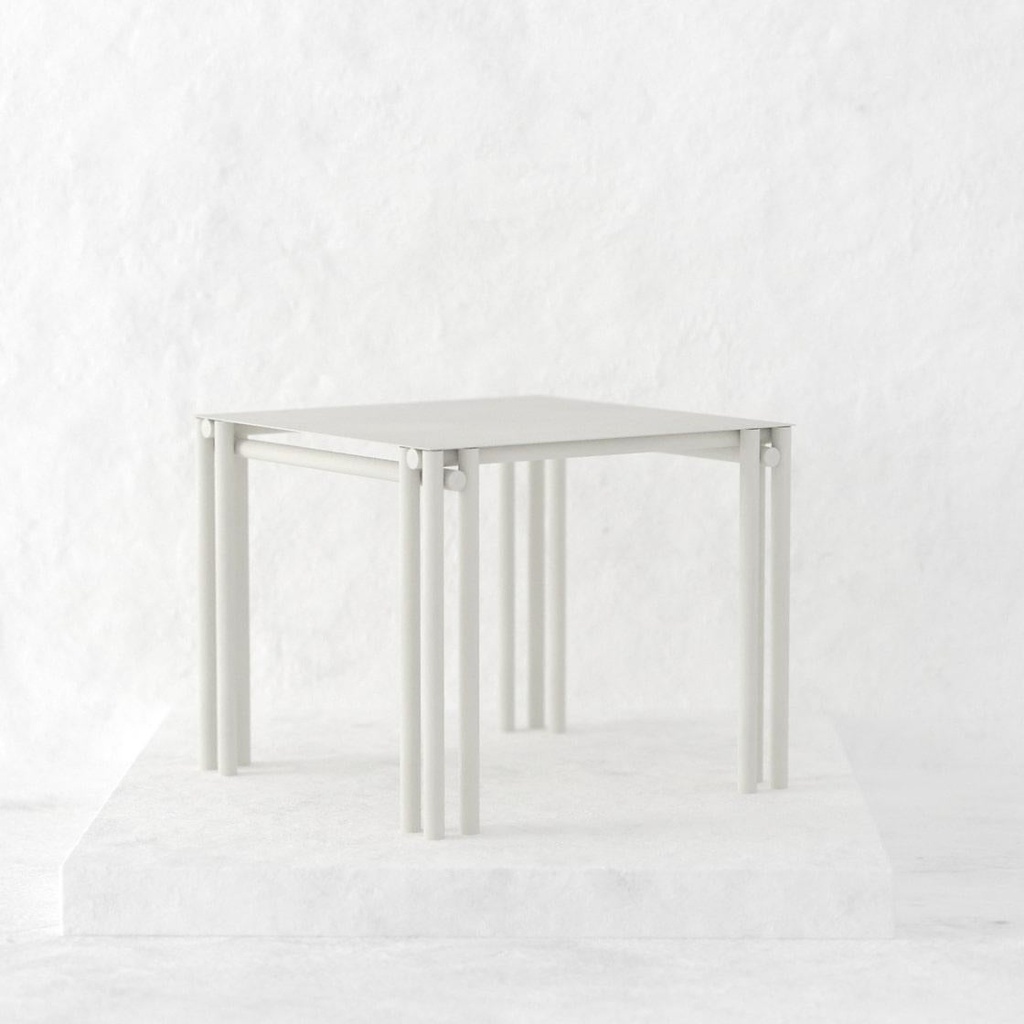https://a.1stdibscdn.com/greige-dolmen-square-dining-table-for-sale-picture-4/f_90372/f_411262021724096974019/a59f76_5674af02a6c64c61a062d70851cc5870_mv2_png_master.jpg