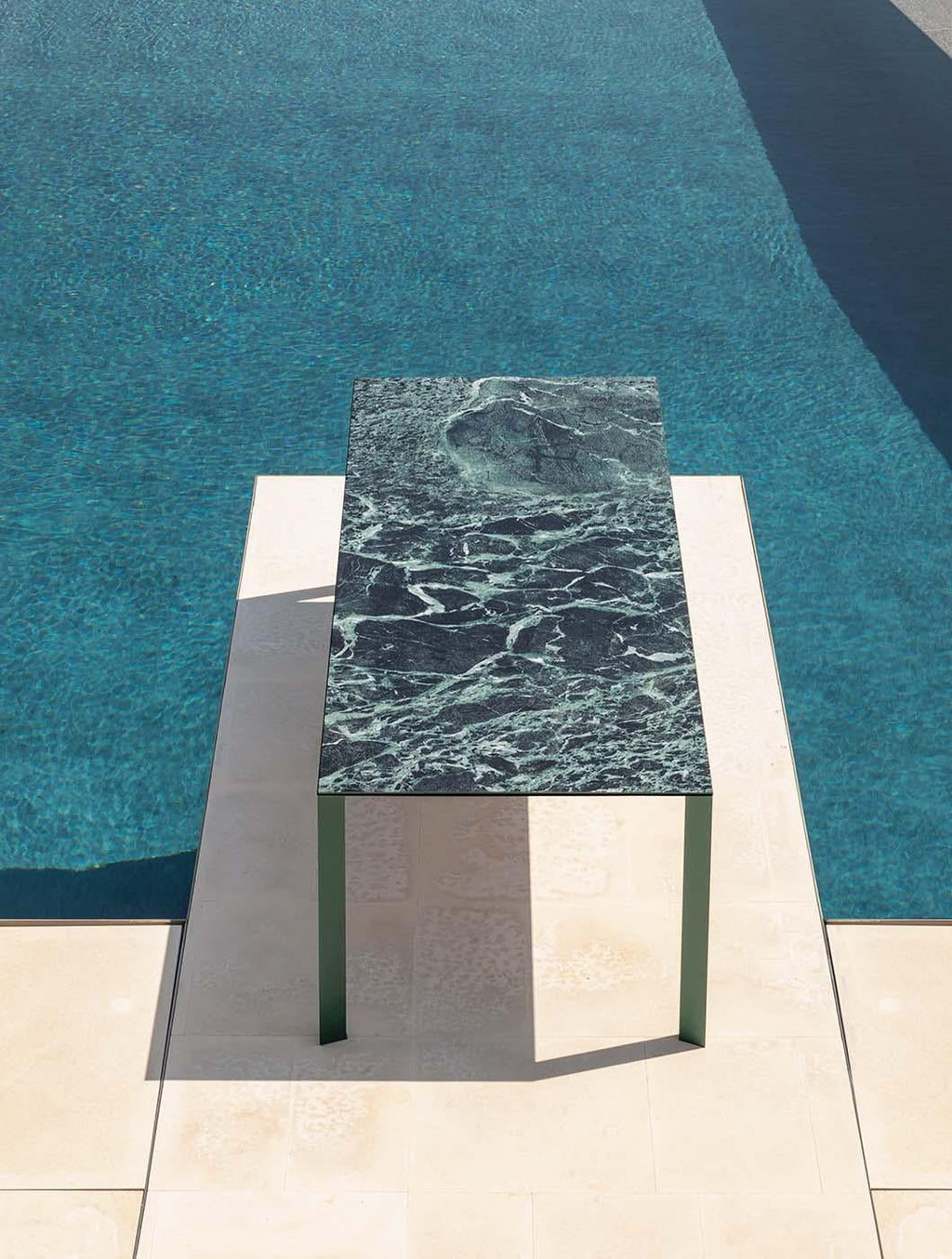 https://a.1stdibscdn.com/outdoor-dining-table-with-black-ceramic-top-for-sale-picture-8/f_27693/f_304441221663276628100/akashi_13_master.jpg