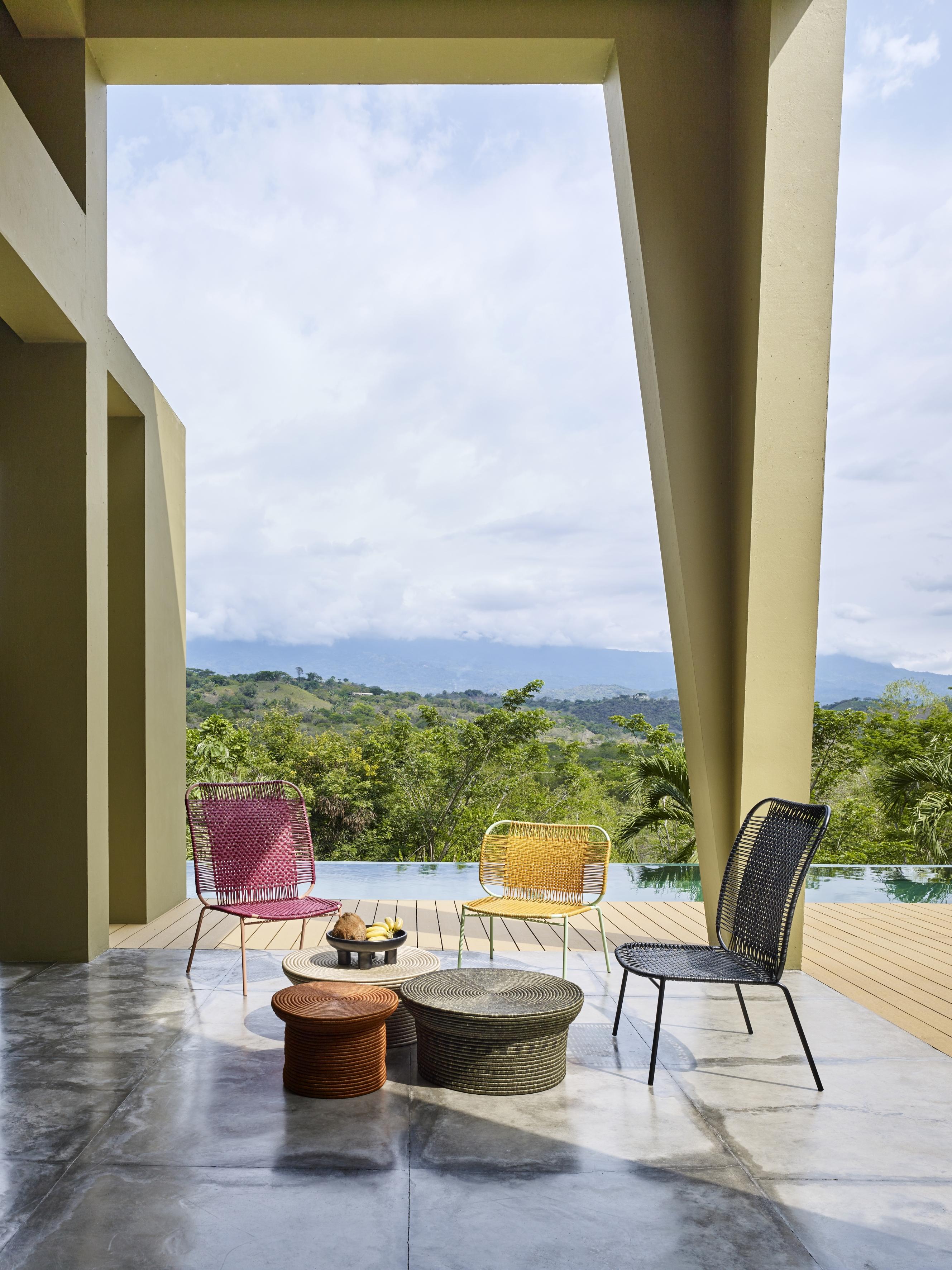 https://a.1stdibscdn.com/set-of-2-olive-cielo-stacking-chair-by-sebastian-herkner-for-sale-picture-10/f_12192/f_318418621671562799489/ames_cielo_lounge_la_che_casa_Andres_Valbuena_master.jpg