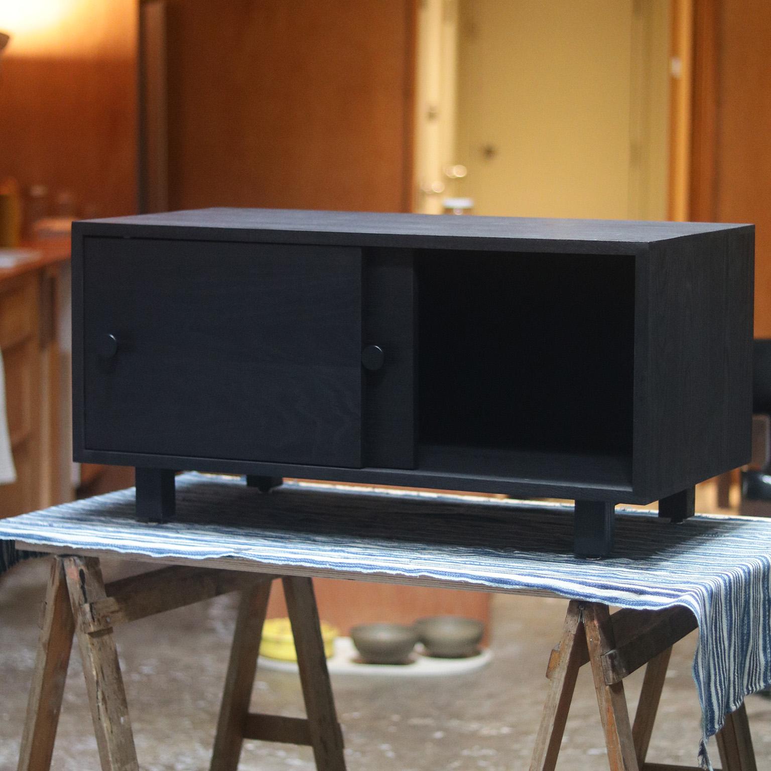 https://a.1stdibscdn.com/aquinas-black-india-ink-solid-oak-compact-sliding-door-cabinet-for-sale-picture-7/f_48391/f_152174421719762812563/aquinas_style_6_master.jpg