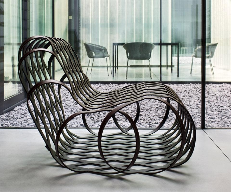 https://a.1stdibscdn.com/contemporary-armchair-made-of-steel-frame-covered-with-saddle-leather-for-sale-picture-2/f_27693/f_434381121738492106853/aria_poltrona_slider_3_master.jpg