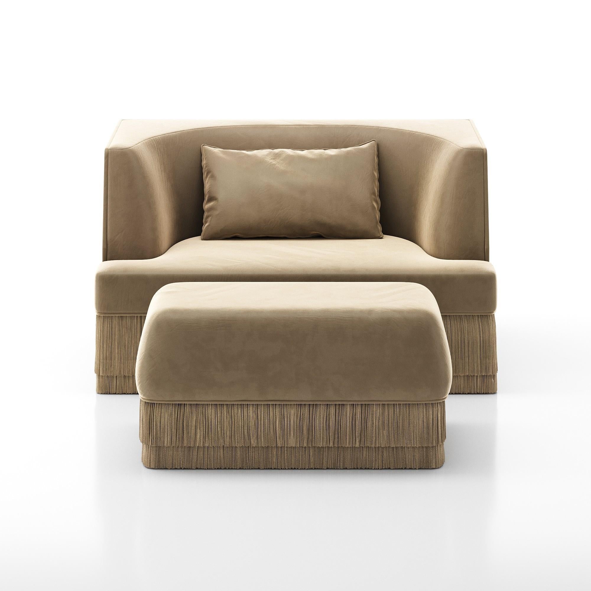 https://a.1stdibscdn.com/alcove-fringe-sofa-with-ottoman-linear-form-fringed-base-by-sidani-design-for-sale-picture-3/f_27693/f_471411221761081401614/armchair_sandSet_cam001_master.jpg