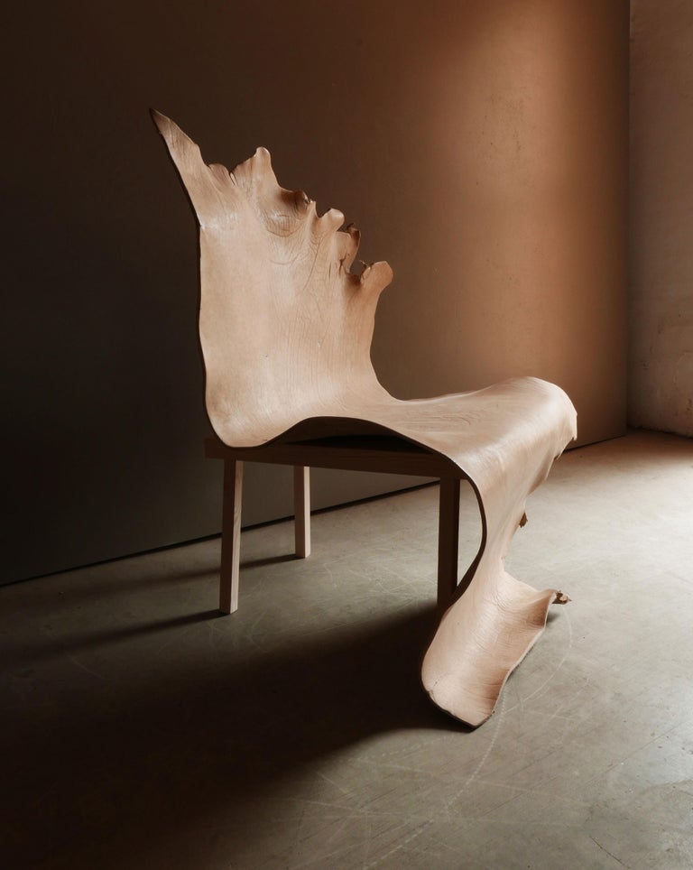https://a.1stdibscdn.com/contemporary-brown-water-buffalo-leather-chairs-atribut-by-jordi-ribaudi-for-sale-picture-9/f_69342/f_488820621771453700716/atributdibs3_master.jpg?width=768