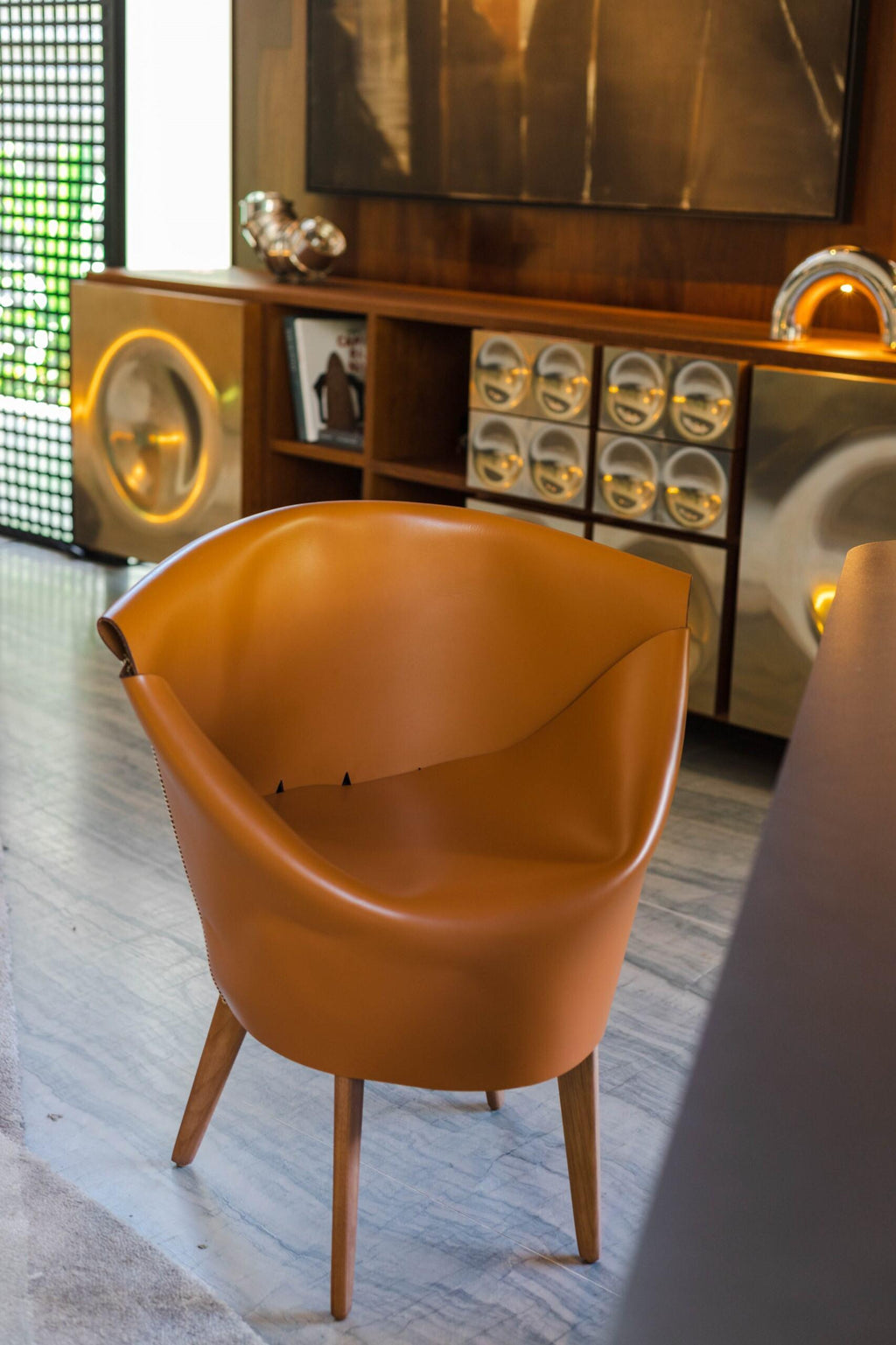 https://a.1stdibscdn.com/ilse-lang-molded-leather-dining-chair-sculptural-comfort-timeless-craft-for-sale-picture-4/f_104502/f_451864721748261289233/b23cd81f_c554_47e5_a810_76d94b13fd10_master.jpg