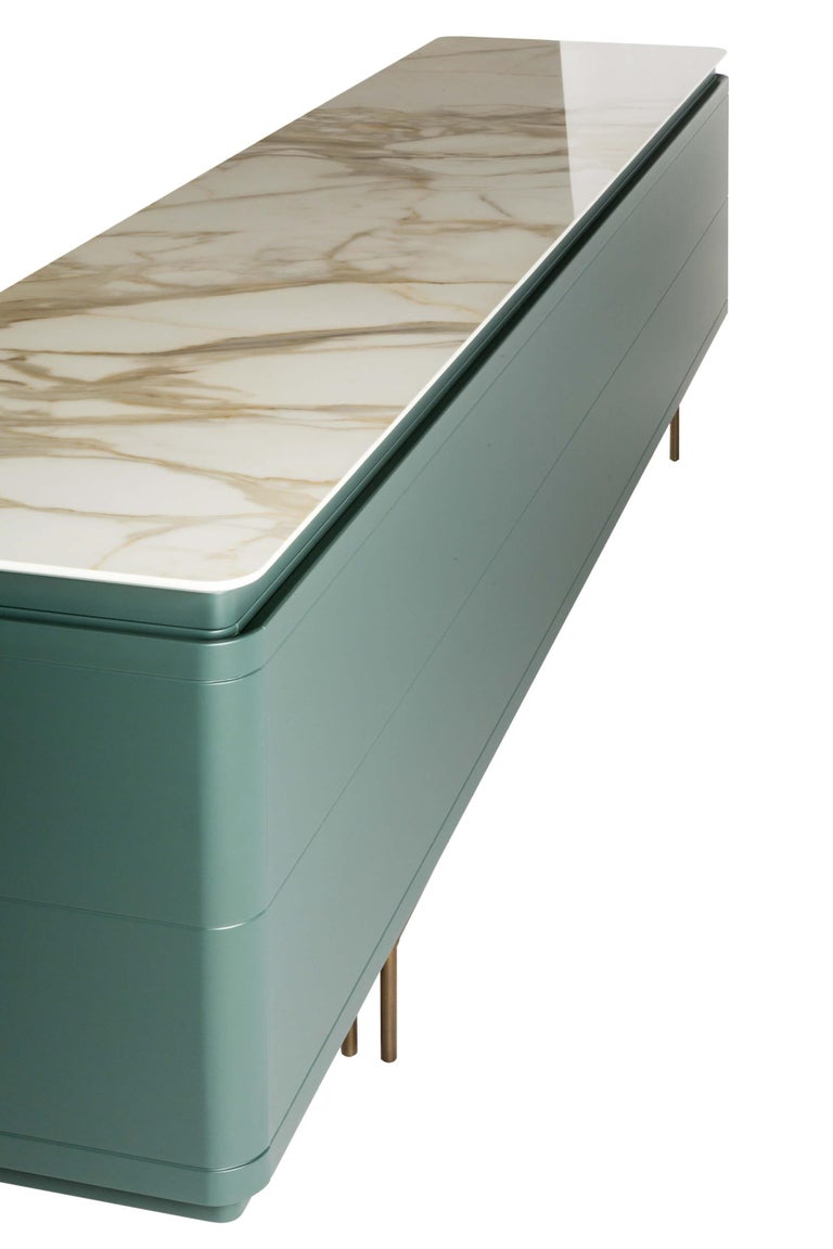 https://a.1stdibscdn.com/contemporary-architectural-sideboard-in-custom-ral-colors-antique-brass-base-for-sale-picture-8/f_27693/f_491527021773119375953/b53c91ffbb0bce9e2675b0e2dc2a1640_master.jpg?width=768