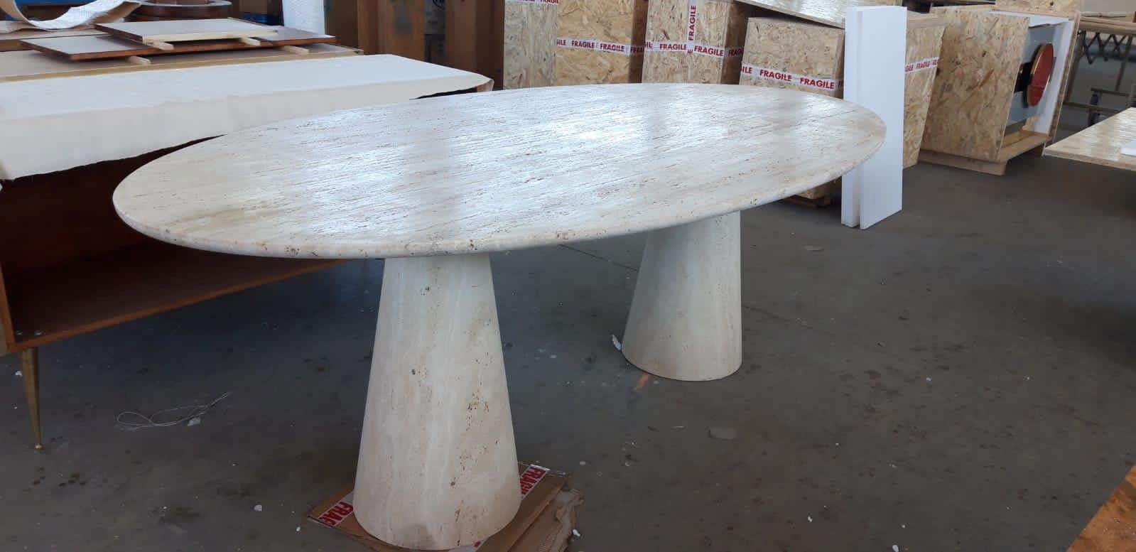 https://a.1stdibscdn.com/bespoke-italian-travertine-oval-dining-table-for-sale-picture-11/f_47872/f_185099721633536465526/b80f80a0_517b_480a_8840_7a02e6c5854c_master.jpeg