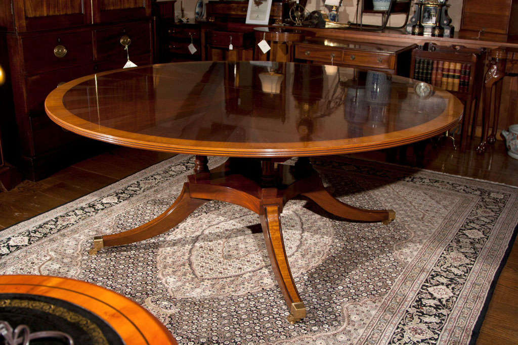 https://a.1stdibscdn.com/custom-english-72-diameter-mahogany-starburst-dining-table-with-leaf-for-sale-picture-2/9420003/f_185103421585523870119/b.jpg