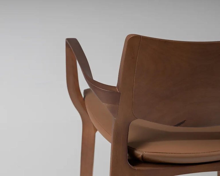 https://a.1stdibscdn.com/post-modern-stool-in-walnut-finish-cane-back-leather-seat-counter-or-bar-hight-for-sale-picture-8/f_35593/f_335528721680123441397/banqueta_aurora_nogueira_assento_couro_detalhe_braco_costa_master.jpg?width=768