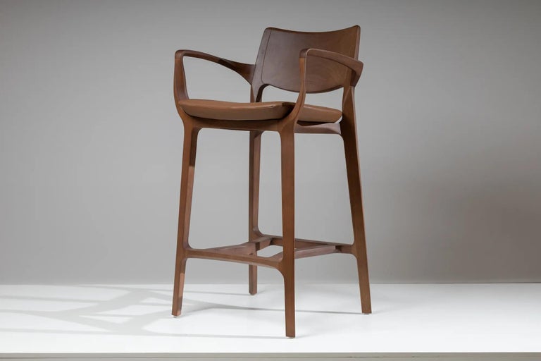 https://a.1stdibscdn.com/post-modern-stool-in-walnut-finish-cane-back-leather-seat-counter-or-bar-hight-for-sale-picture-3/f_35593/f_335528721680123625935/banqueta_aurora_nogueira_assento_couro_diagonal_master.jpg?width=768
