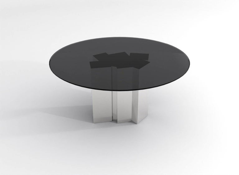 https://a.1stdibscdn.com/contemporary-round-dining-table-in-black-glass-and-high-polished-stainless-steel-for-sale-picture-3/f_48321/f_315445221669914153628/barh_not_so_blue_table_01_High_Gloss_Steel_x_Black_Glass_2_master.jpg?width=768