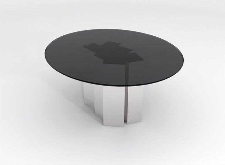 https://a.1stdibscdn.com/contemporary-round-dining-table-in-black-glass-and-high-polished-stainless-steel-for-sale-picture-4/f_48321/f_315445221669914153770/barh_not_so_blue_table_01_High_Gloss_Steel_x_Black_Glass_3_master.jpg?width=768