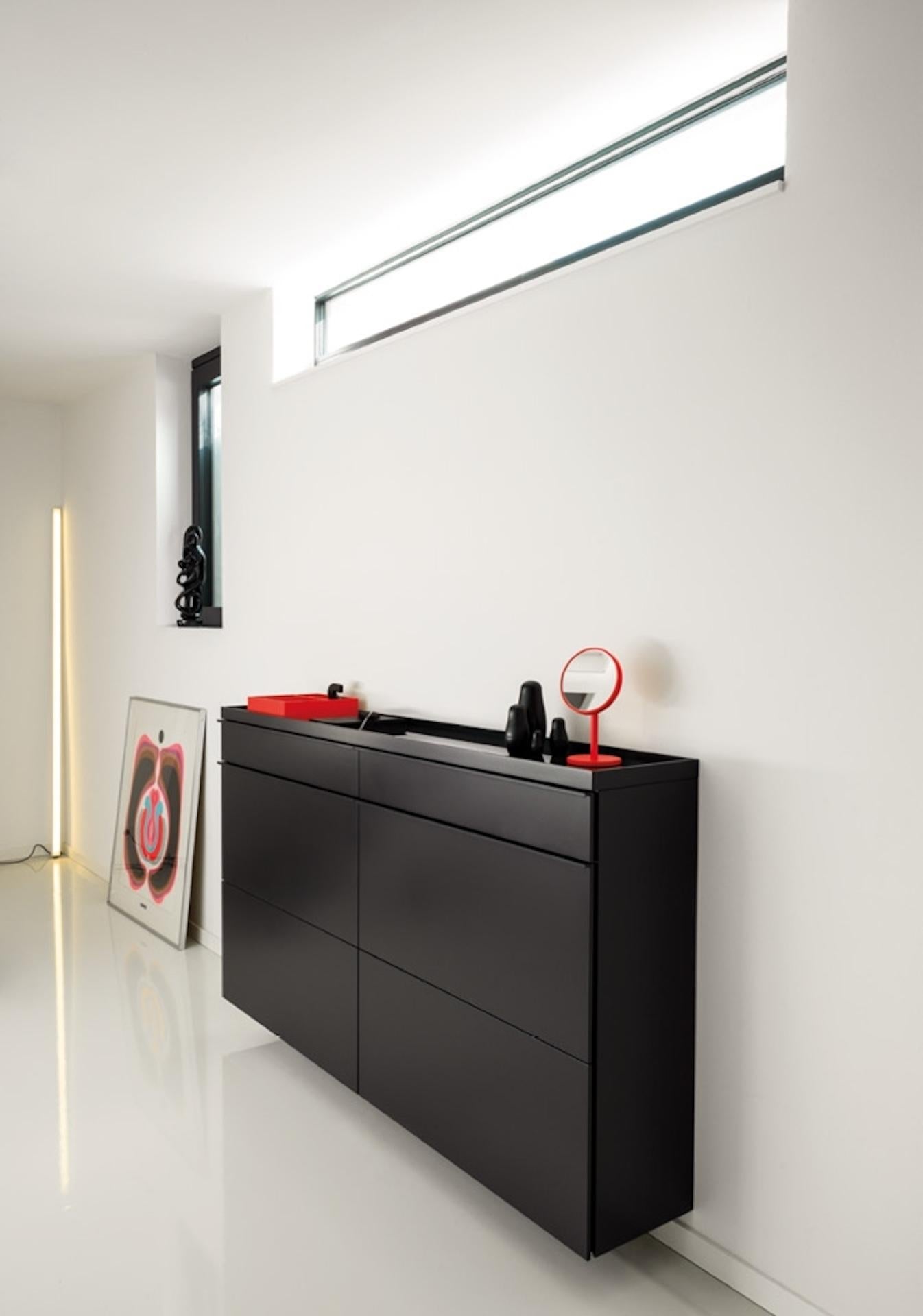 https://a.1stdibscdn.com/customizable-s-for-sale-picture-8/f_44652/f_404640321720032188264/basic_schuhschrank_klappenschuhschrank_schwarz_schoenbuch_beauty_schminkspiegel_neonorange_hesperide_kaestchen_neonorange_frame_leuchte_stableuchte_wei_colour_dolls_schwarz_am_2_master.jpg