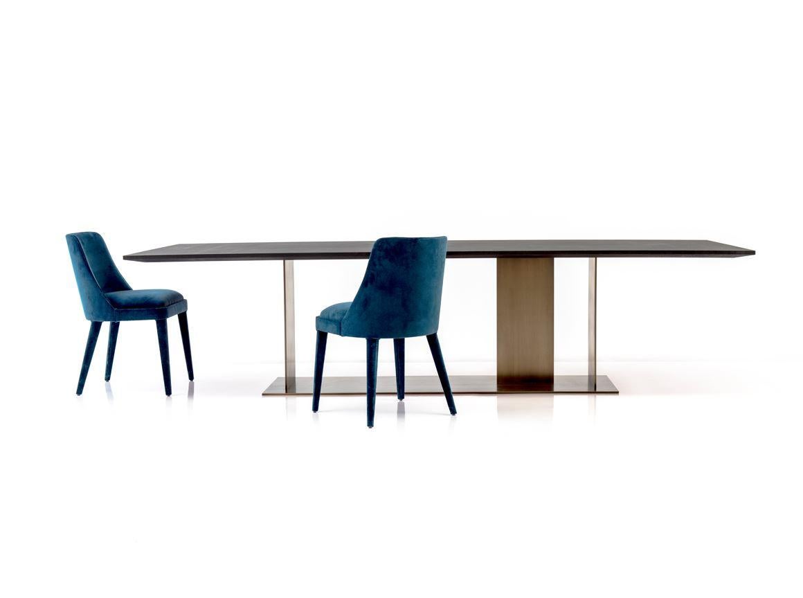 https://a.1stdibscdn.com/berlino-dining-table-in-matt-wood-for-sale-picture-3/f_62722/f_272843621644335393933/berlino_con_sedie_master.JPG