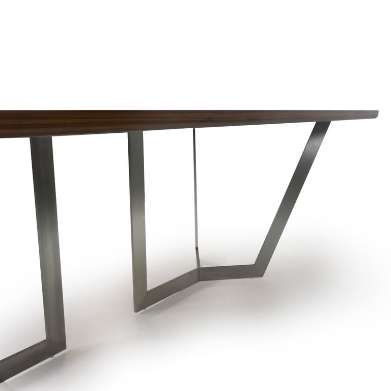 https://a.1stdibscdn.com/modern-dining-room-table-with-wooden-top-and-stainless-finished-legs-for-sale-picture-4/f_21233/1545239690699/bichtable_derail2_master.jpg?width=768
