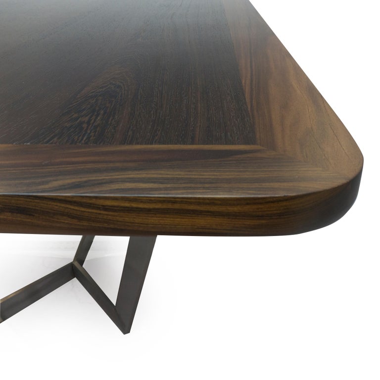 https://a.1stdibscdn.com/modern-dining-room-table-with-wooden-top-and-stainless-finished-legs-for-sale-picture-6/f_21233/1545239711096/bichtable_detail4_master.jpg?width=768