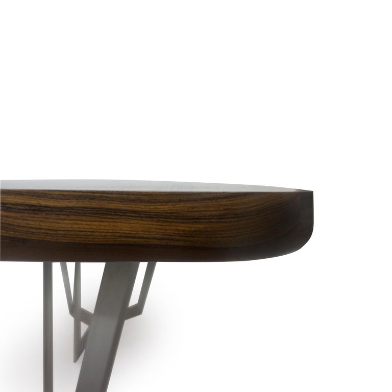 https://a.1stdibscdn.com/modern-dining-room-table-with-wooden-top-and-stainless-finished-legs-for-sale-picture-7/f_21233/1545239716966/bichtable_detail5_master.jpg?width=768