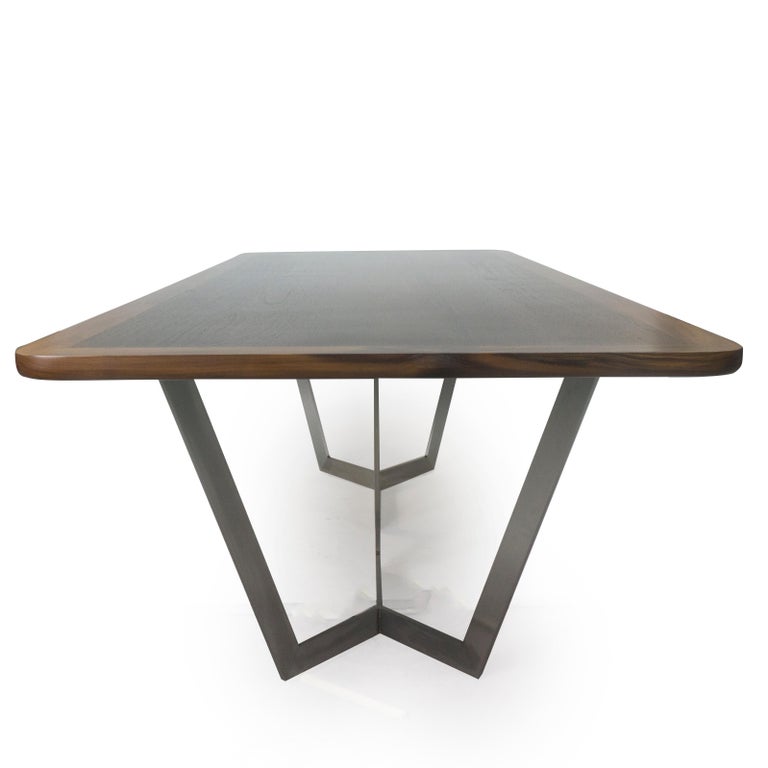 https://a.1stdibscdn.com/modern-dining-room-table-with-wooden-top-and-stainless-finished-legs-for-sale-picture-3/f_21233/1545239740143/bichtable_side2_master.jpg?width=768