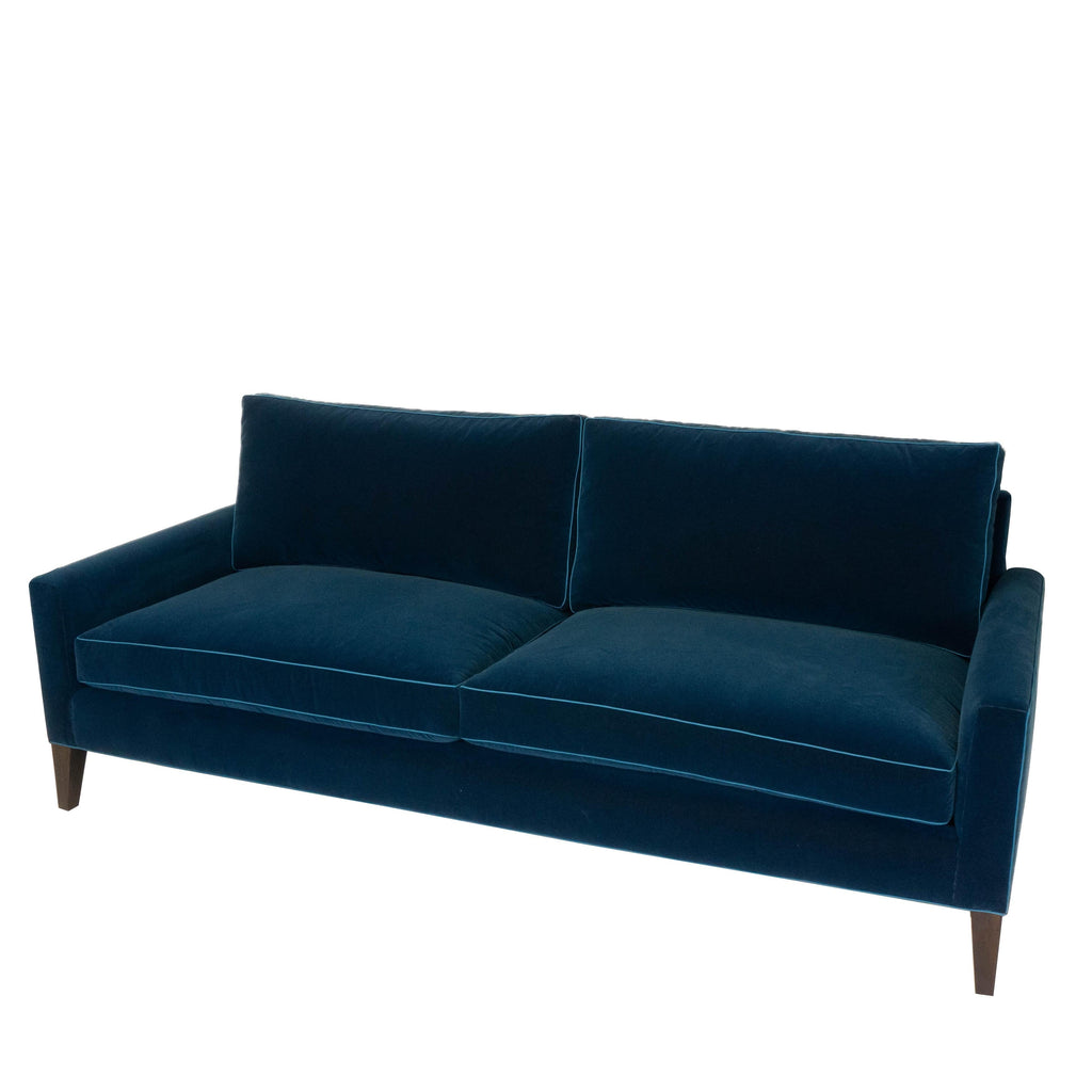 https://a.1stdibscdn.com/modern-two-cushion-sofa-in-dark-blue-velvet-for-sale-picture-3/f_21233/f_128288921543341184363/bluevelvet_angle_master.jpg
