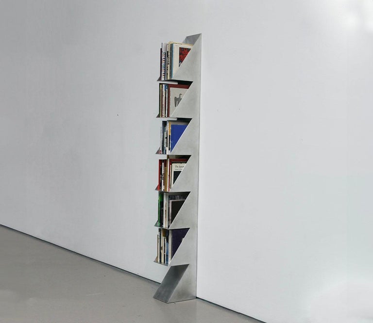 https://a.1stdibscdn.com/1234567-aluminum-bookshelf-by-clay-brown-for-sale-picture-3/f_37133/f_437856321740428310864/books_master.jpg?width=768