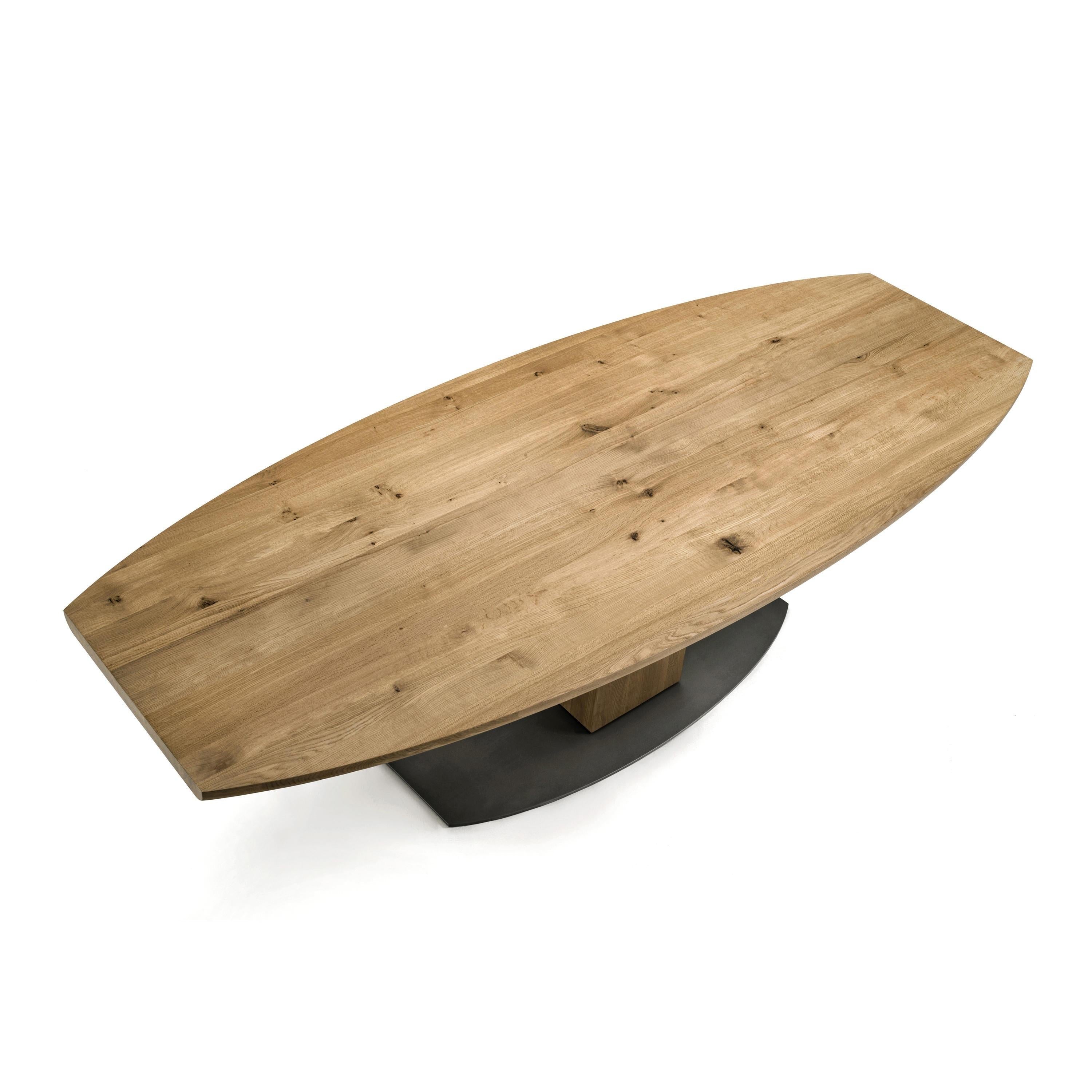 https://a.1stdibscdn.com/solid-wood-oval-dining-table-with-metal-base-for-sale-picture-3/f_27693/f_434708521738667286140/boss_basic_02_02_pro_g_arcit18_master.jpg