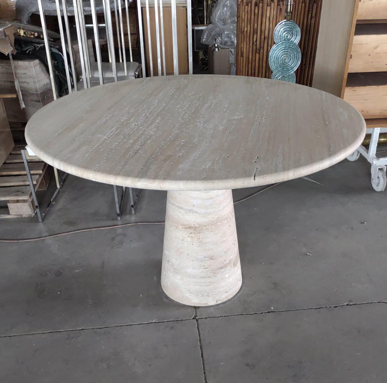 https://a.1stdibscdn.com/bespoke-round-italian-dining-table-in-travertine-for-sale-picture-11/f_47872/f_291371521689942964577/ca3f21f9_4fc7_40cf_9056_20429fa6eb8b_master.jpeg