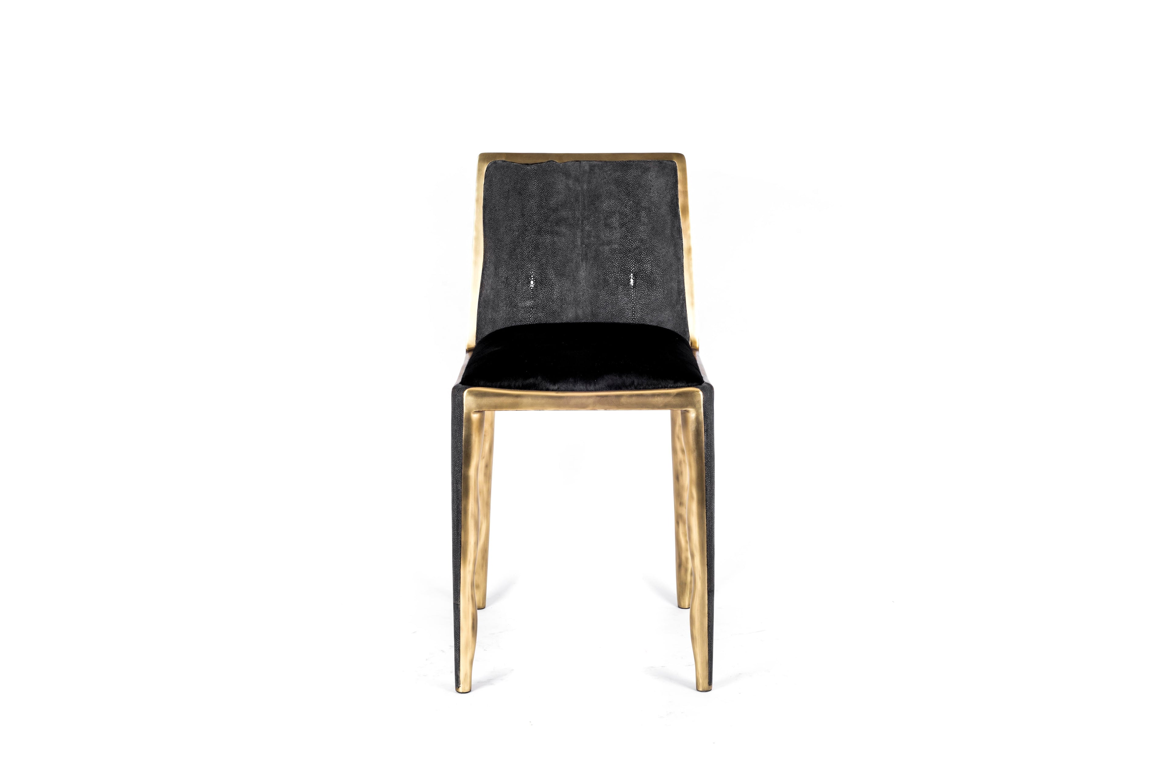 https://a.1stdibscdn.com/melting-chair-in-blue-shagreen-and-bronze-patina-brass-by-ry-augousti-for-sale-picture-10/f_45491/f_163723221570372456671/ch33_d156_v1_master.jpg