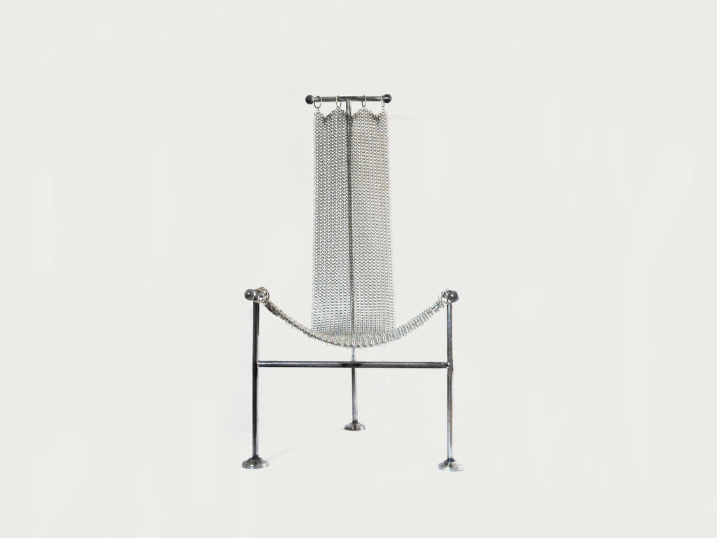 https://a.1stdibscdn.com/chainmail-sculptural-chair-nickel-plated-steel-finish-hand-linked-mesh-for-sale-picture-2/f_69682/f_361508621694644906352/chainmailchair_original_master.jpg