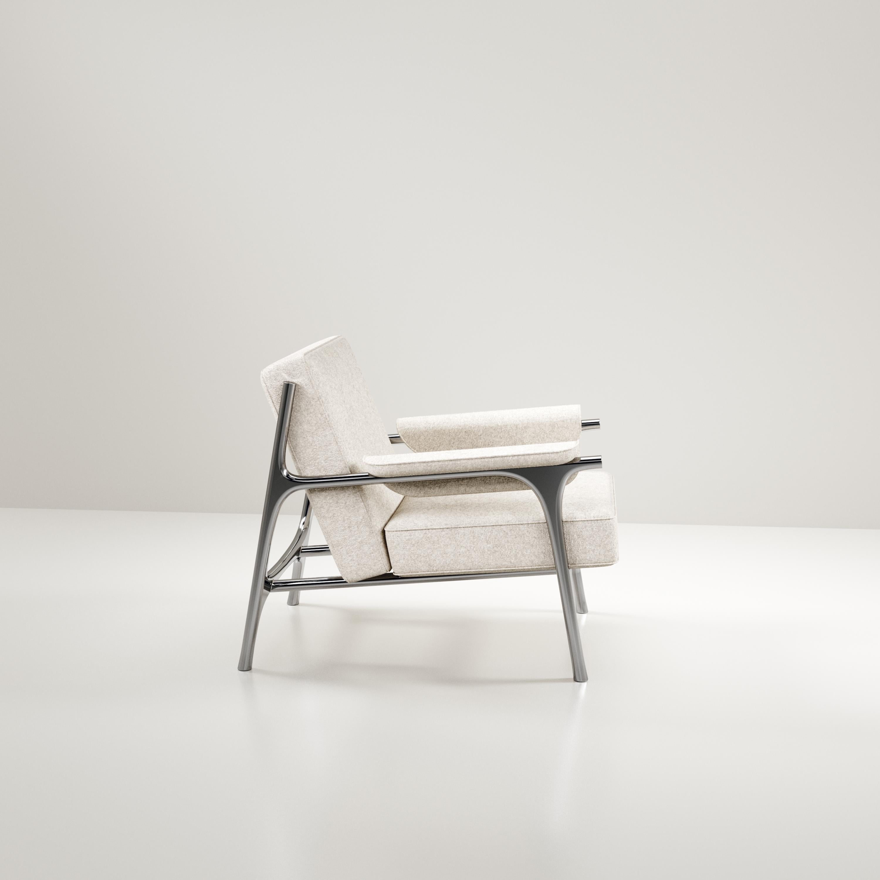 https://a.1stdibscdn.com/upholstered-armchair-with-chrome-finish-stainless-steel-details-by-ry-augousti-for-sale-picture-4/f_45491/f_354985521690872286239/chair_OPT_PLUMERIA0002_master.jpg