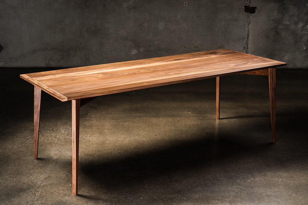 https://a.1stdibscdn.com/charis-mid-century-modern-styled-solid-walnut-dining-table-minimalist-for-sale-picture-4/f_86132/f_341378421683241623380/charis2_master.jpg