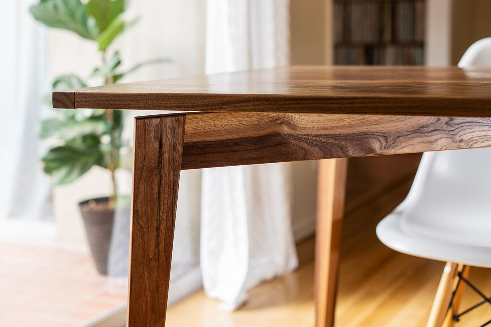 https://a.1stdibscdn.com/charis-mid-century-modern-styled-solid-walnut-dining-table-minimalist-for-sale-picture-5/f_86132/f_341378421683241621546/charis3_master.jpg