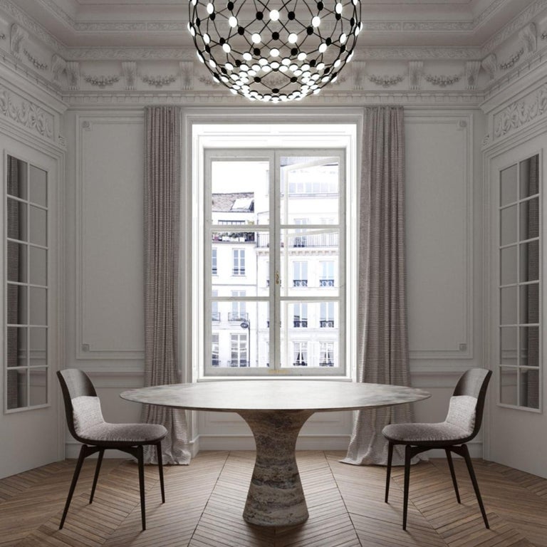 https://a.1stdibscdn.com/kynos-refined-contemporary-marble-dining-table-180-75-for-sale-picture-4/f_12192/f_319953521672428087294/classictravertinosilverpost_1348x1348_master.jpg?width=768