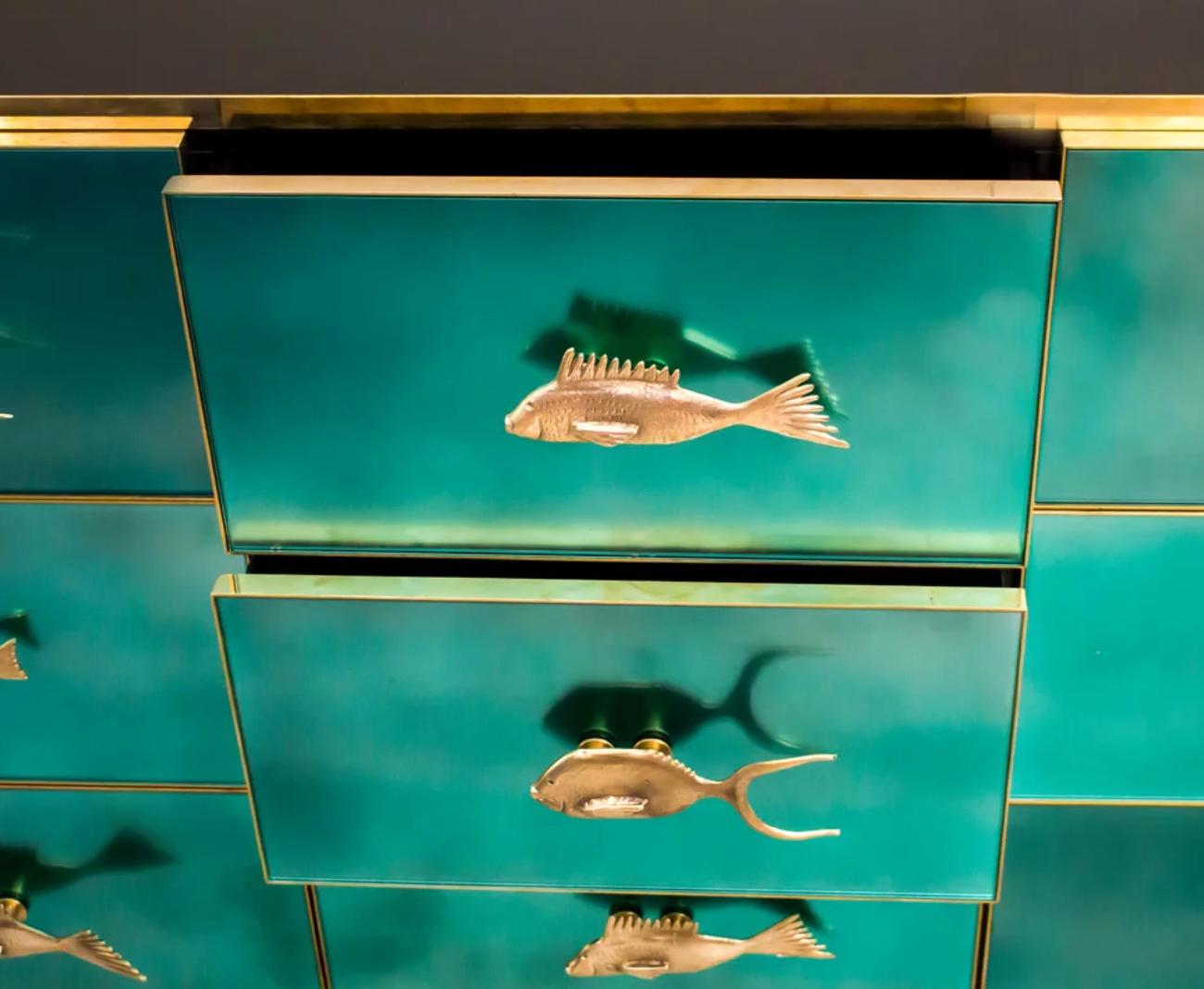 https://a.1stdibscdn.com/bespoke-italian-art-design-brass-emerald-green-glass-9-drawer-dresser-sideboard-for-sale-picture-5/f_54472/f_267937021641486372968/close_up_master.jpeg