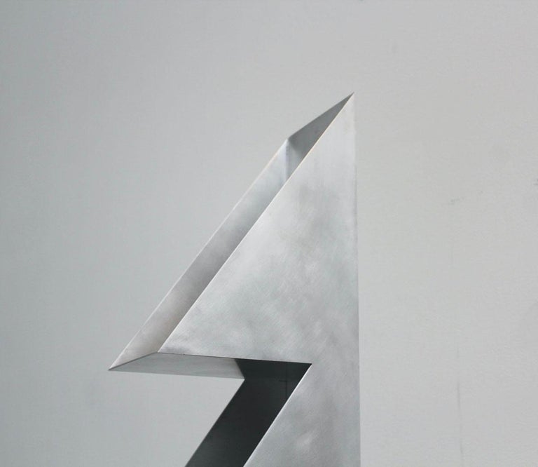 https://a.1stdibscdn.com/1234567-aluminum-bookshelf-by-clay-brown-for-sale-picture-5/f_37133/f_437856321740428310876/closeup_master.jpg?width=768