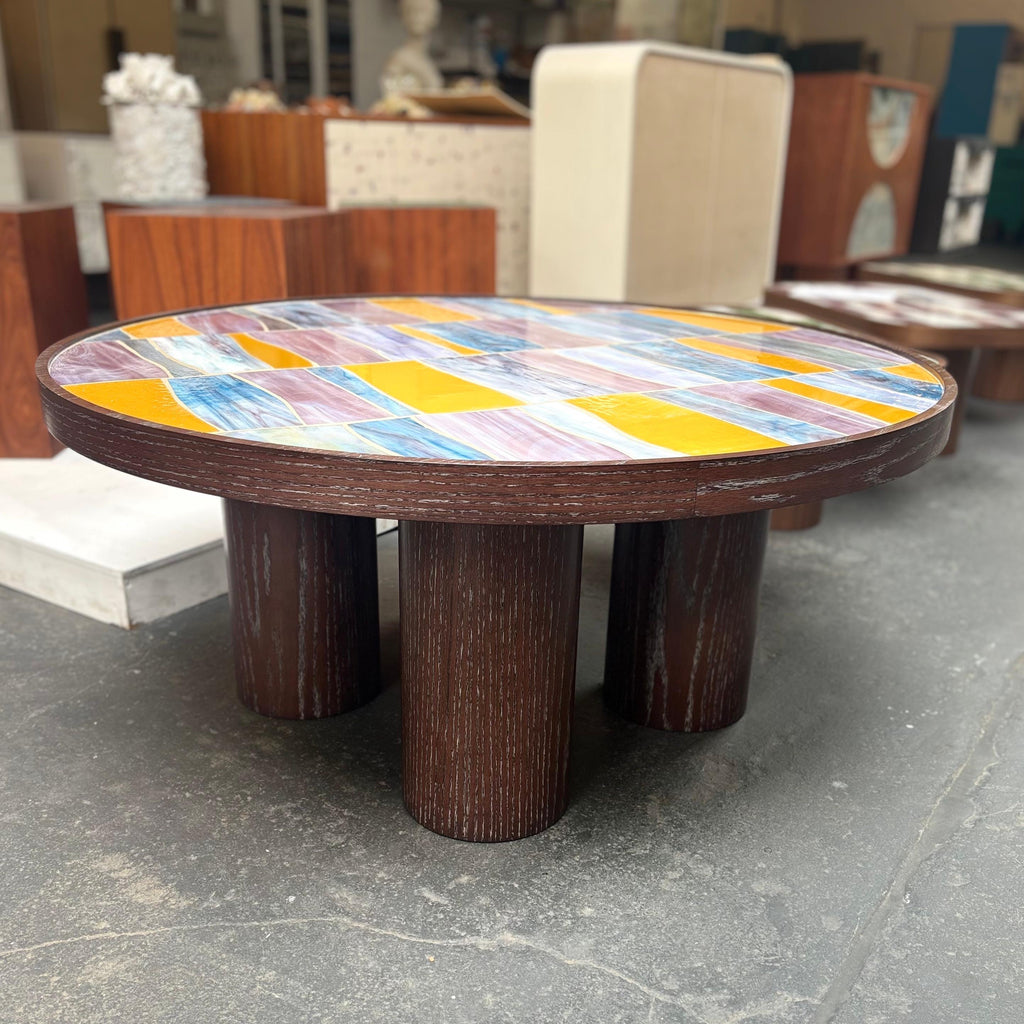 https://a.1stdibscdn.com/modern-round-coffee-table-with-glass-top-and-oak-pedestal-base-by-ercole-home-for-sale-picture-5/f_42371/f_461690921759935249977/colored_palazzo_master.jpg