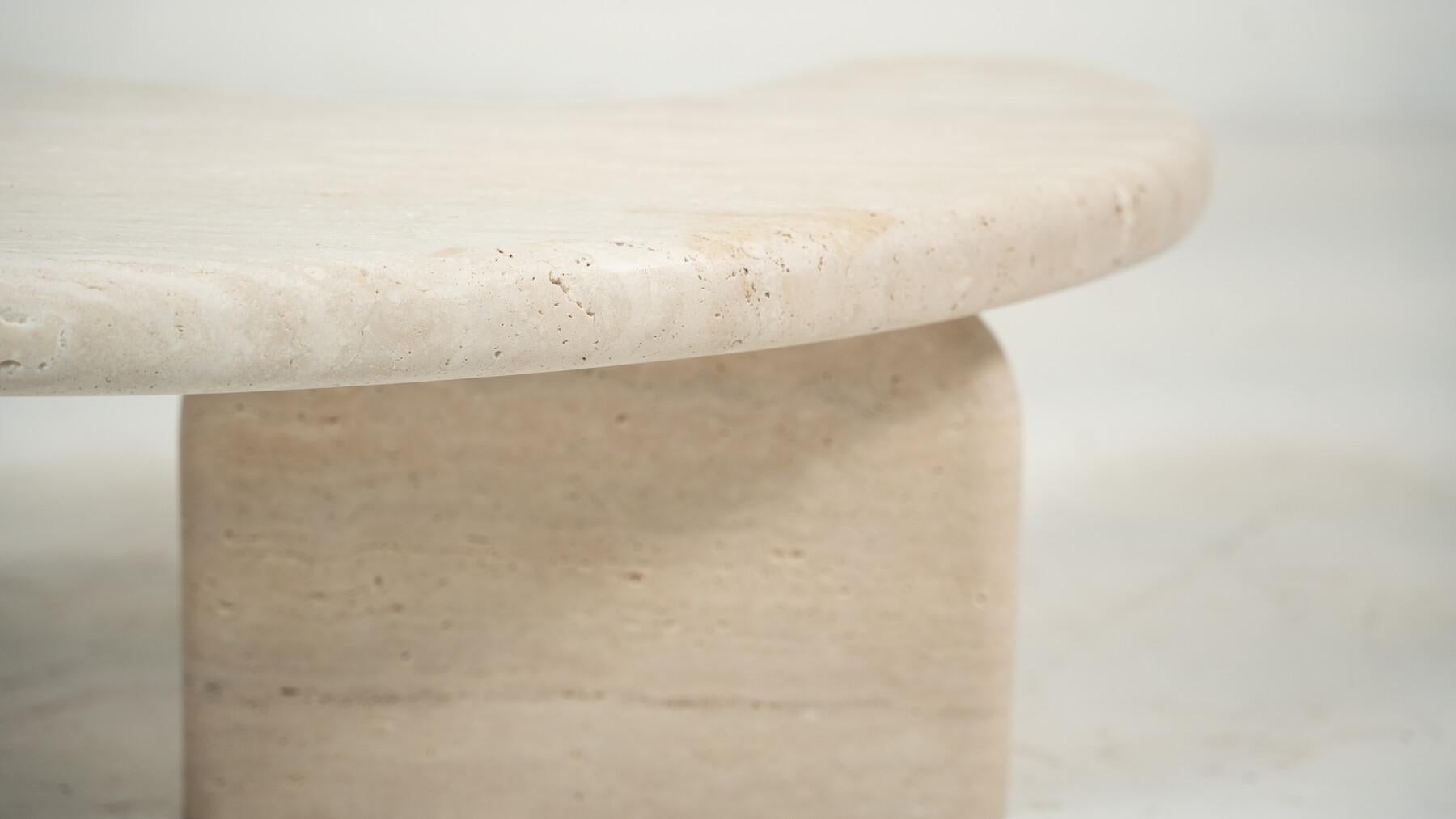 https://a.1stdibscdn.com/sculptural-organic-shape-travertine-coffee-table-by-my-habitat-design-for-sale-picture-6/f_80522/f_467097121758211837496/contemporary_bean_shaped_travertine_coffee_table_23961380_en_max6_master.jpg