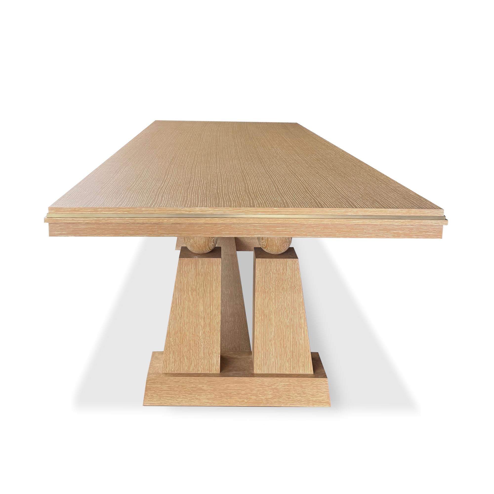 https://a.1stdibscdn.com/corvaux-pedestal-oak-dining-table-with-brass-inlay-by-christiane-lemieux-for-sale-picture-6/f_69542/f_481548021767295217225/corvaux_dine_silo_side_view_copy_master.jpg
