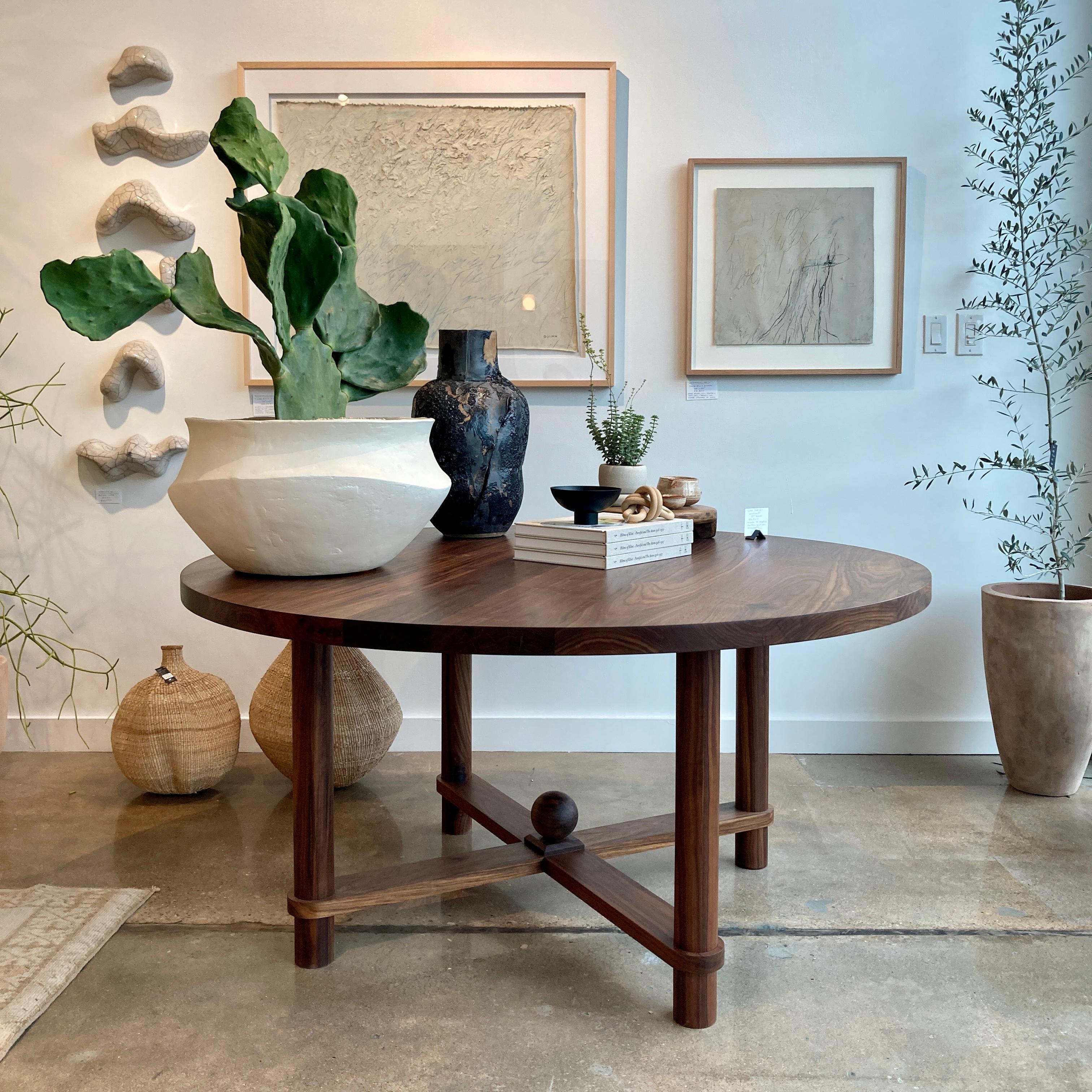 https://a.1stdibscdn.com/contemporary-round-dining-table-59-diameter-walnut-for-sale-picture-2/f_109082/f_494070921774640810451/custom_wooden_furniture_northern_new_jersey_round_circular_walnut_dining_table_display_master.JPEG