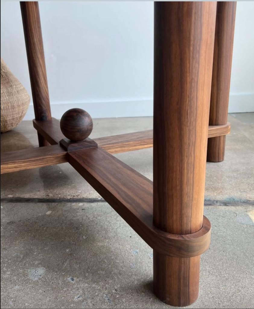 https://a.1stdibscdn.com/contemporary-round-dining-table-59-diameter-walnut-for-sale-picture-3/f_109082/f_494070921774640810248/custom_wooden_furniture_northern_new_jersey_walnut_dining_table_foot_detail_master.jpeg
