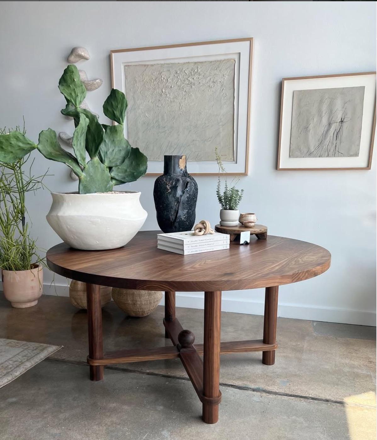 https://a.1stdibscdn.com/contemporary-round-dining-table-59-diameter-walnut-for-sale-picture-5/f_109082/f_494070921774640810370/custom_wooden_furniture_northern_new_jersey_walnut_round_dining_table_on_display2__master.jpeg
