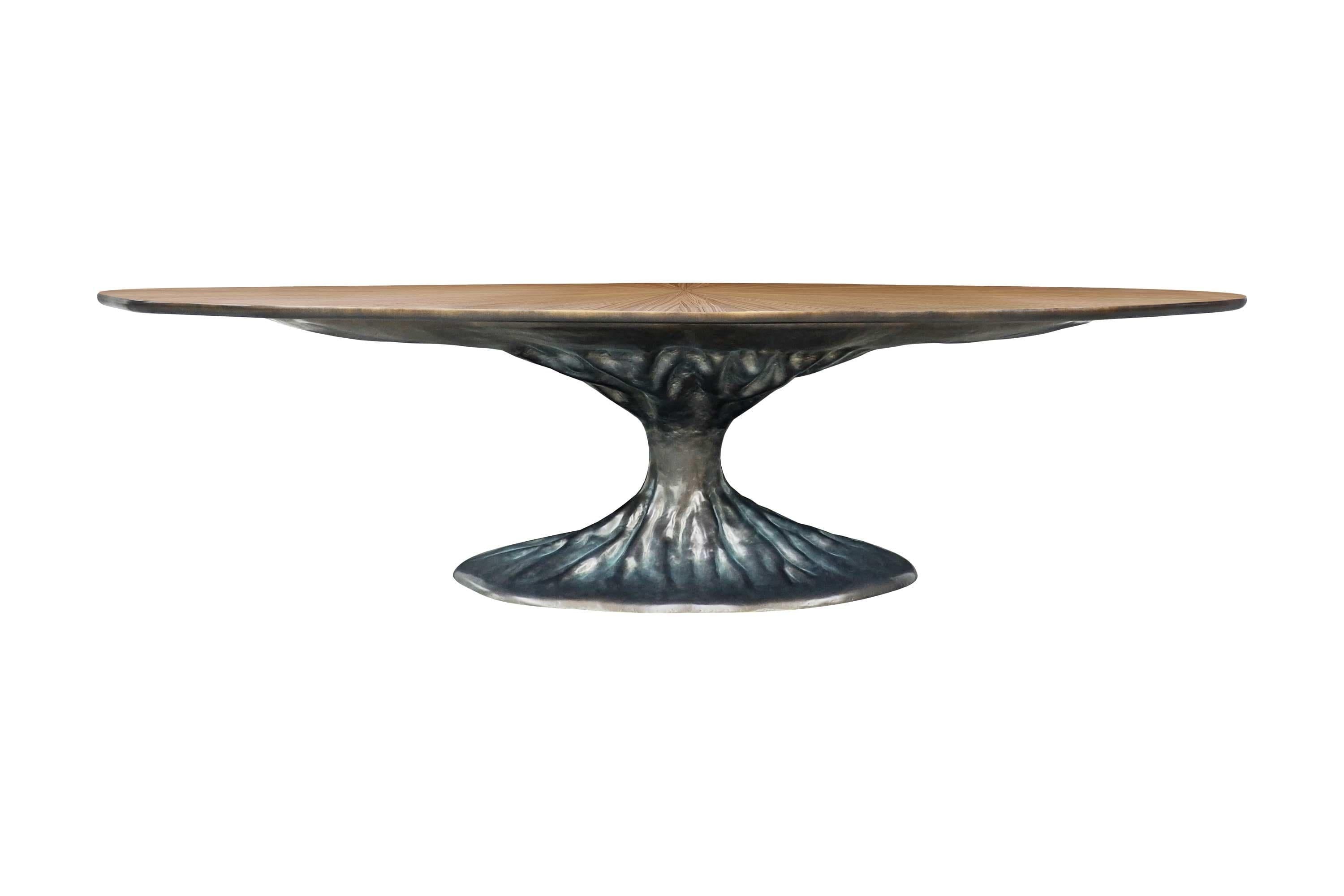 https://a.1stdibscdn.com/biophilic-dining-table-with-walnut-root-wood-top-for-sale-picture-9/f_27693/f_377792121704752906785/dining_table_exclusive_luxurious_sculptural_trunk_bronze_sunburst_walnut_oval_master.jpg