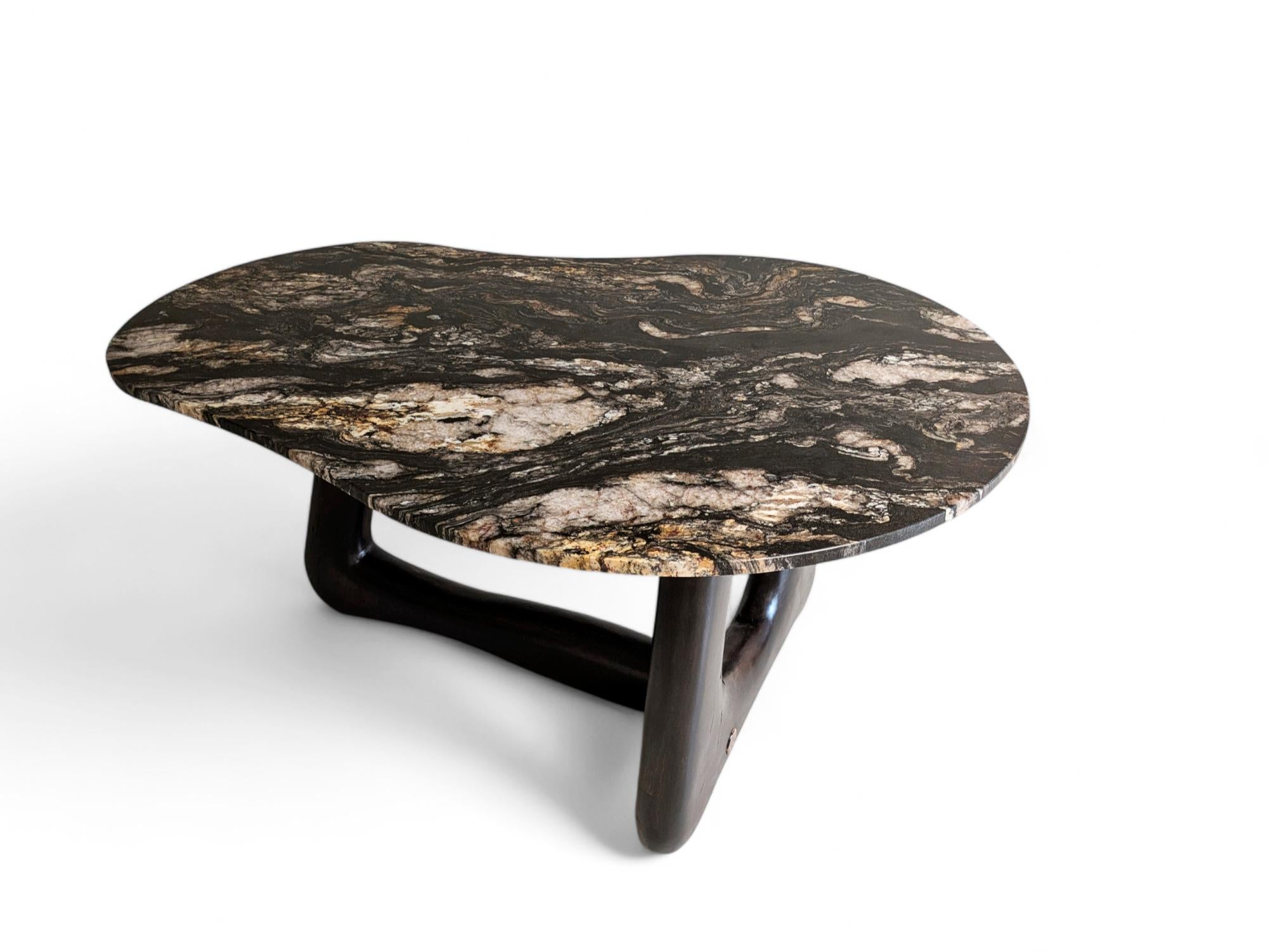 https://a.1stdibscdn.com/narco-teak-collection-dining-table-pebble-by-inigo-calleja-for-sale-picture-2/f_12192/f_433792921738157231441/dining_table_pebble_Narcoteak_2_master.jpg