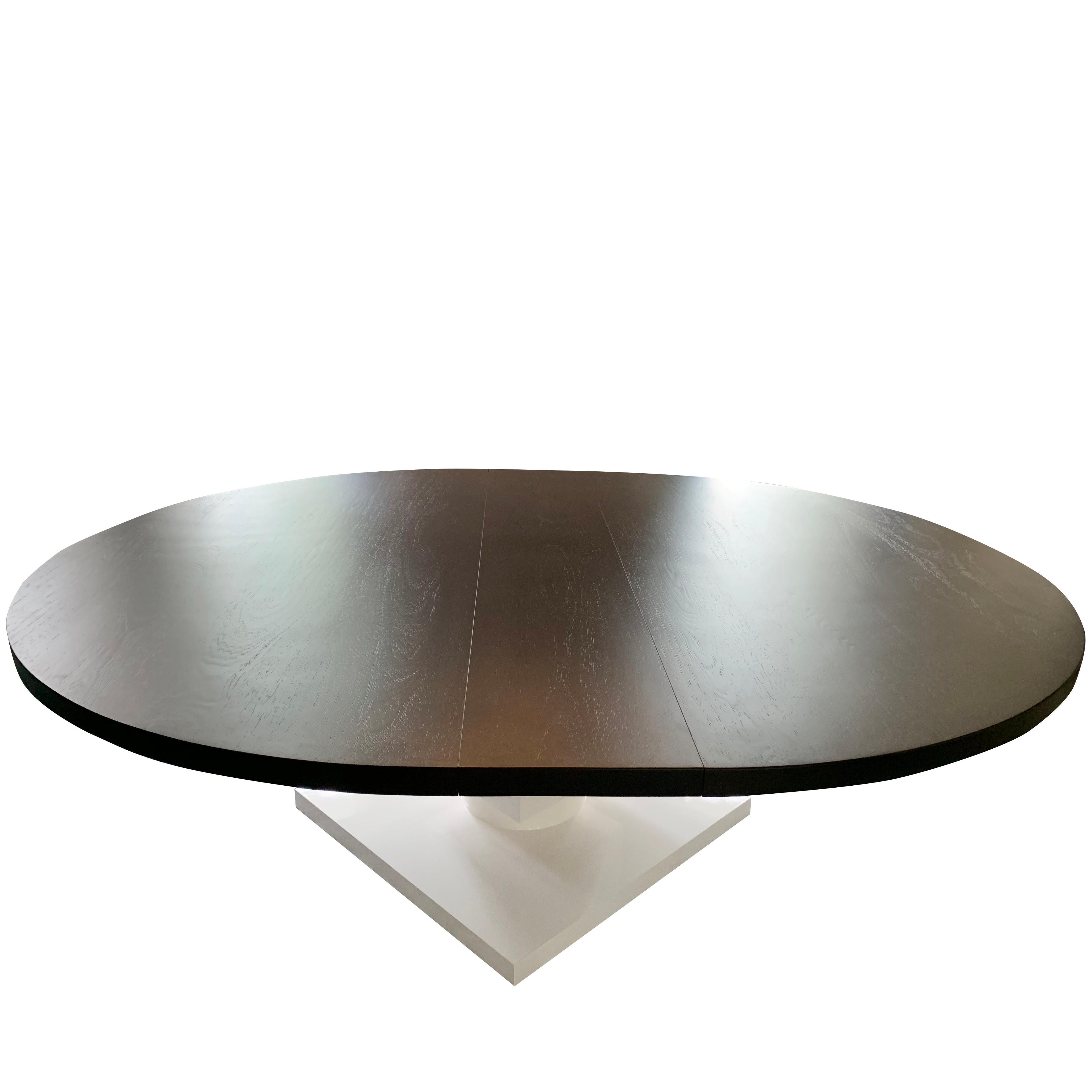 https://a.1stdibscdn.com/round-extendable-dining-table-with-cube-pedestal-base-for-sale-picture-3/f_21233/1570827839019/diningtable_7077_master.jpg