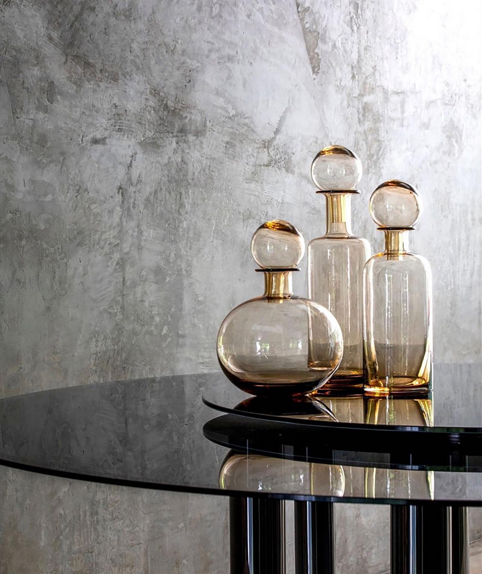 https://a.1stdibscdn.com/discoteca-round-table-with-transparent-fume-glass-top-for-sale-picture-7/f_62722/f_279176221648048811831/discoteca_master.jpg
